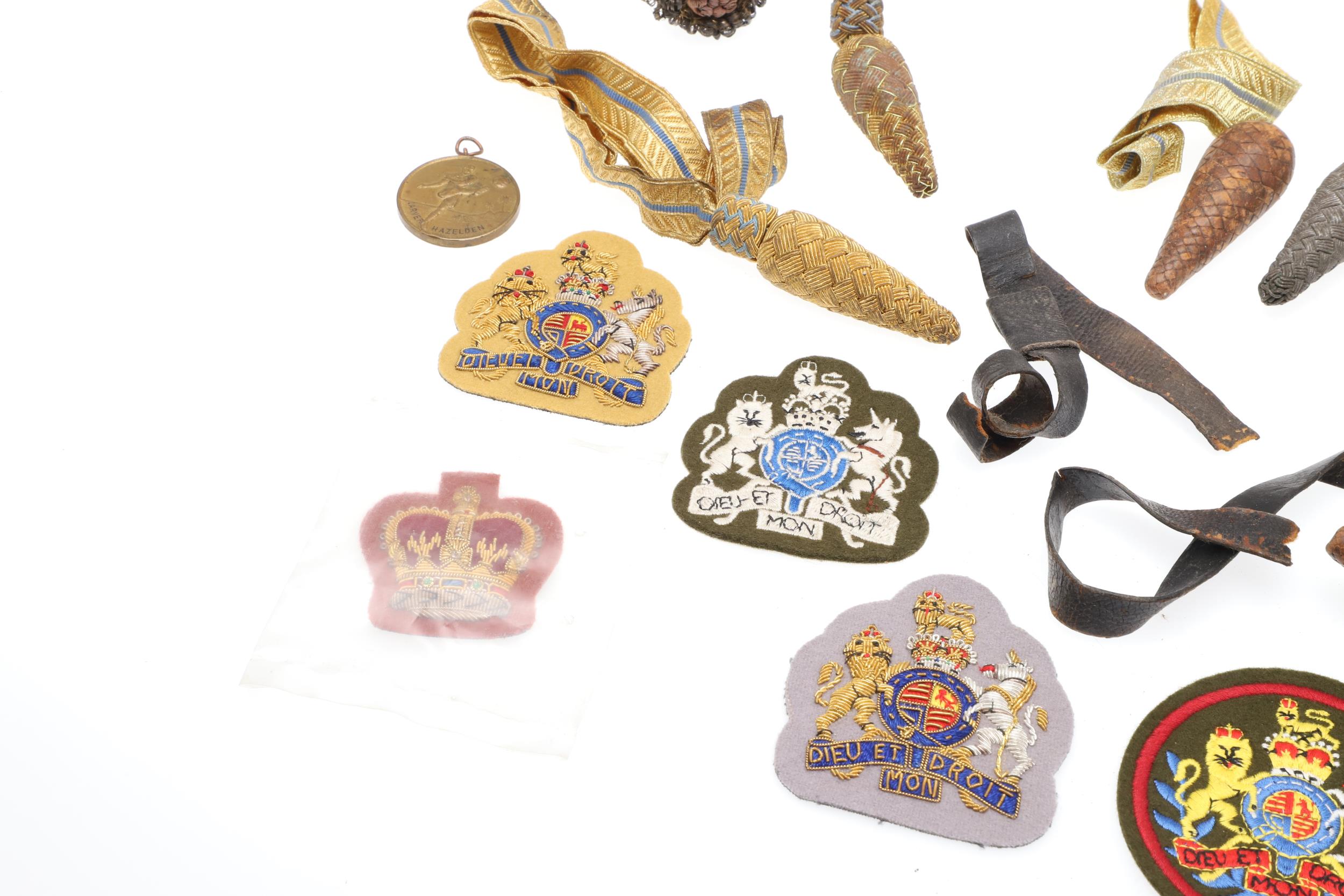 A COLLECTION OF SWORD KNOTS AND MILITARY BADGES. - Image 9 of 11