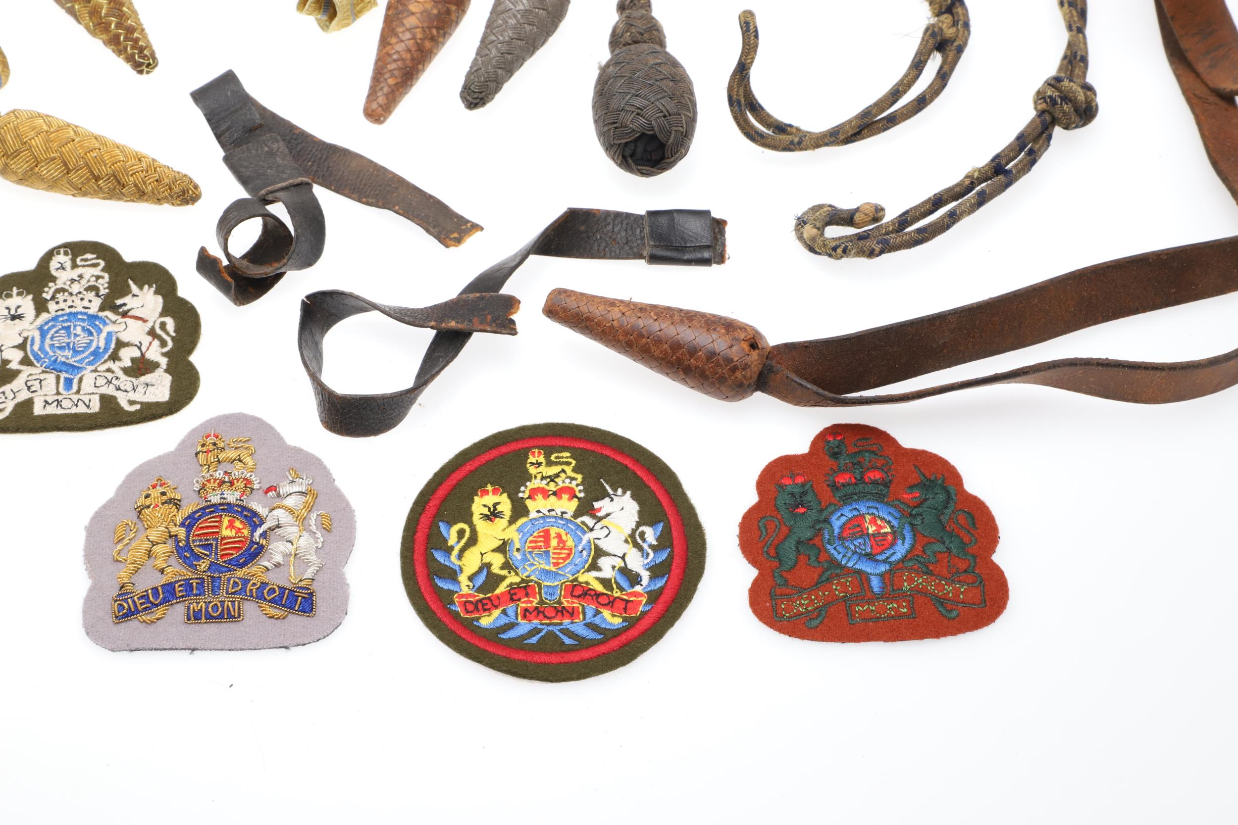 A COLLECTION OF SWORD KNOTS AND MILITARY BADGES. - Image 8 of 11
