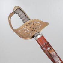 A GEORGE V 1897 PATTERN SERGEANTS SWORD AND SCABBARD.