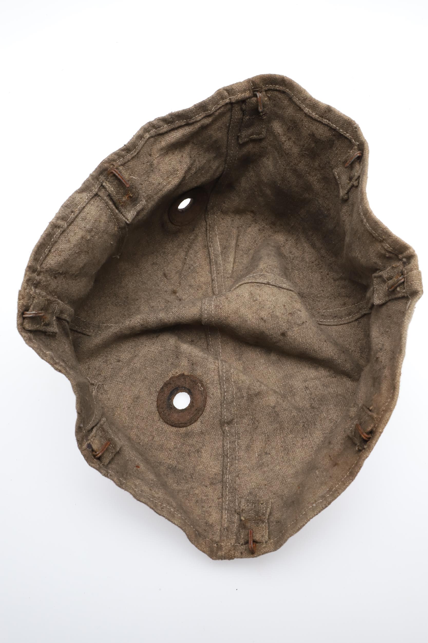 A FIRST WORLD WAR GERMAN STEEL HELMET CLOTH COVER. - Image 5 of 7