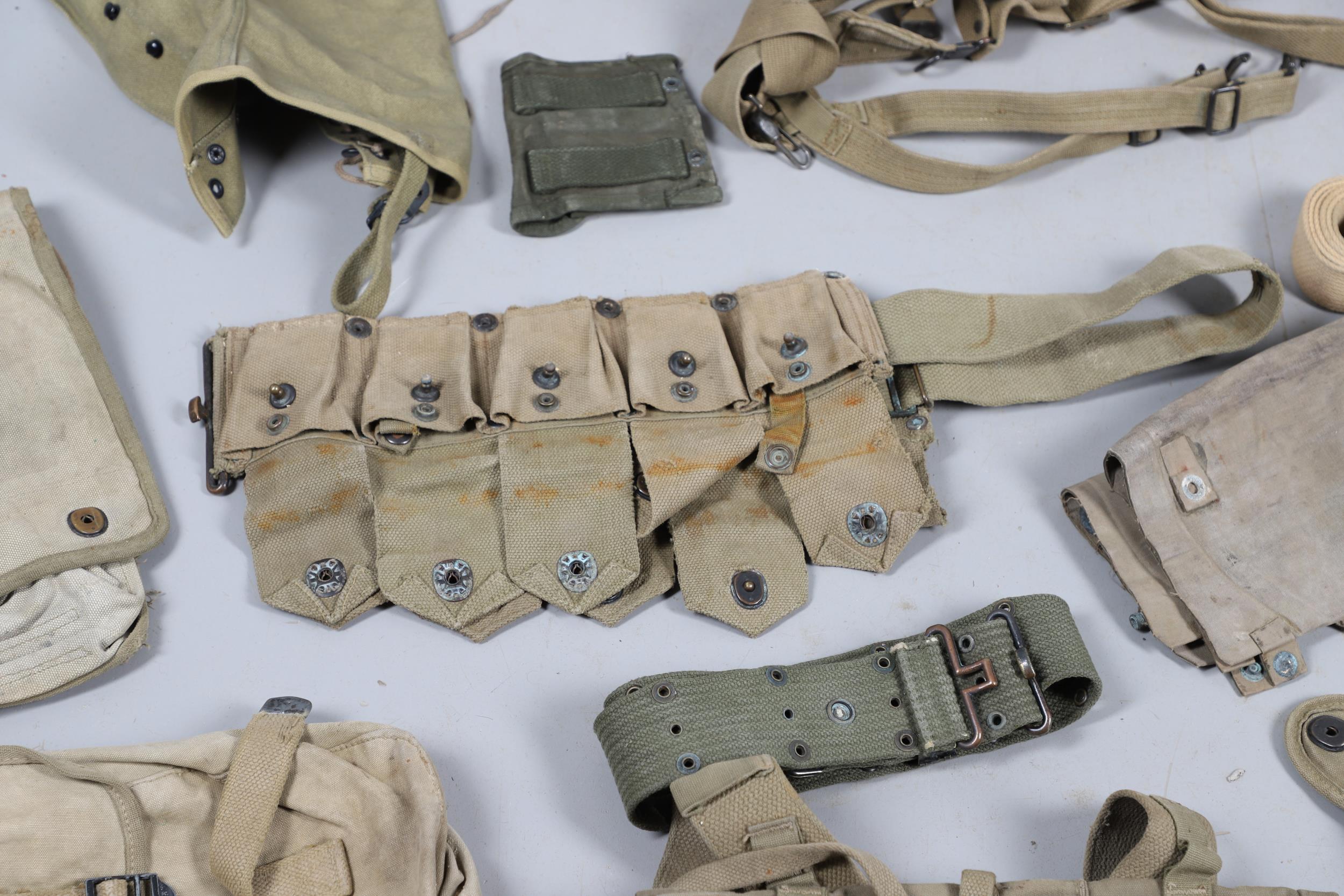 A COLLECTION OF SECOND WORLD WAR AND LATER AMERICAN WEBBING AND SIMILAR ITEMS. - Image 27 of 29