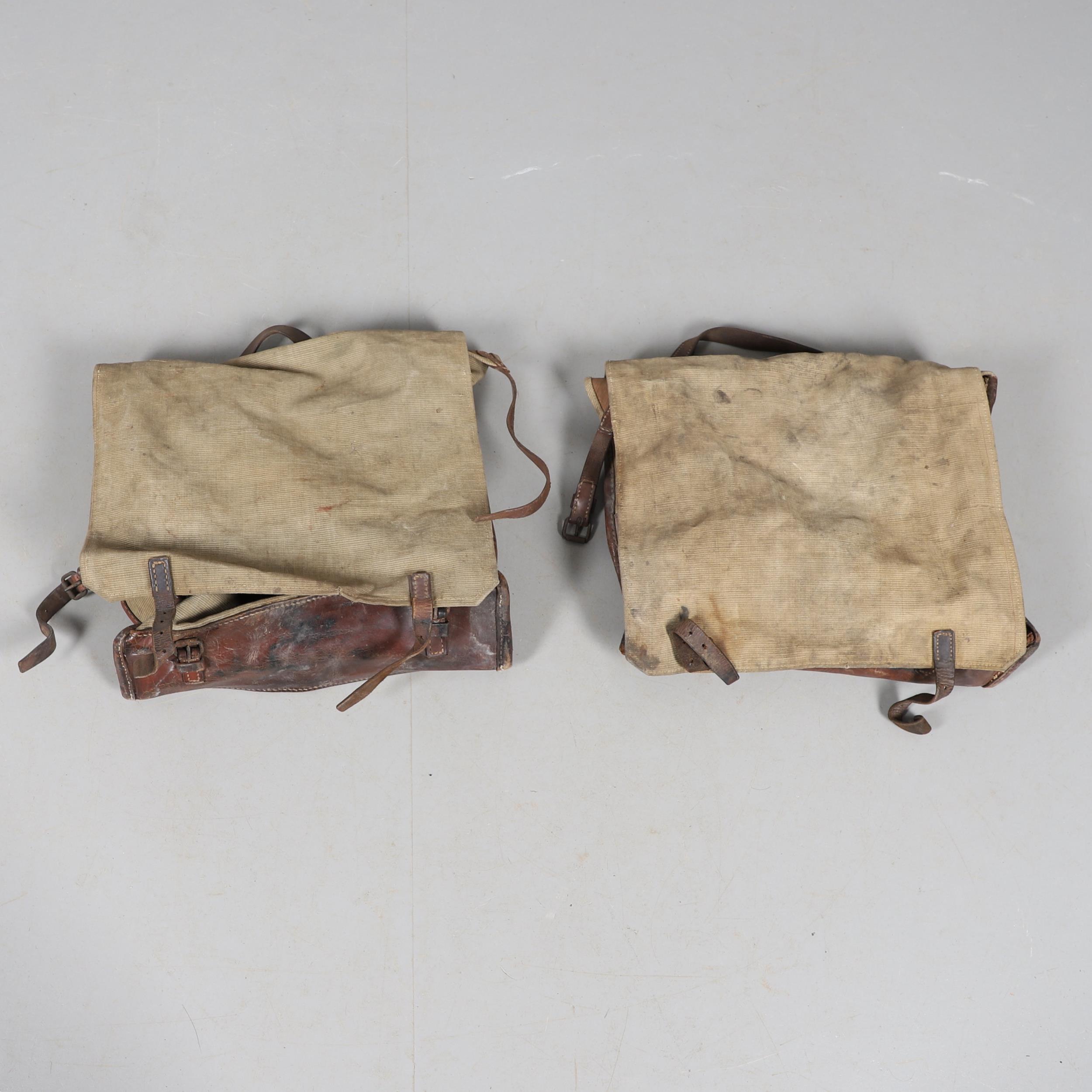 TWO FIRST WORLD WAR PERIOD LEATHER AND CANVAS DOCUMENT CASES.