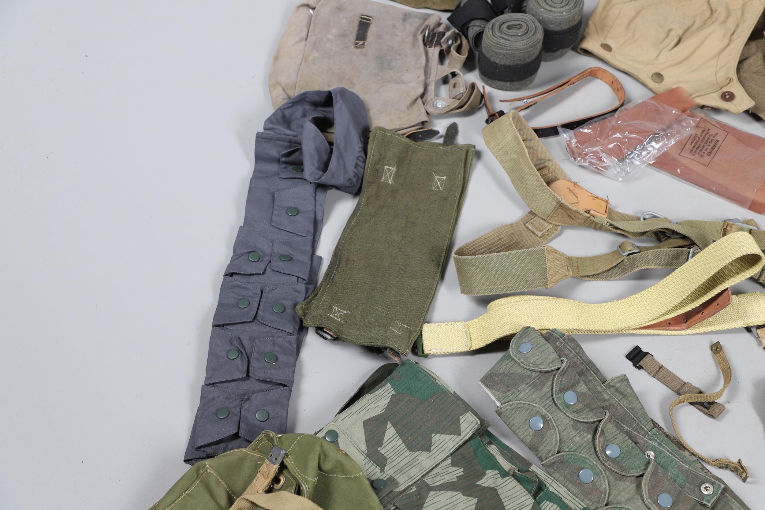 A LARGE COLLECTION OF WEBBING BELTS, KNEE PADS AND OTHER UNIFORM ITEMS, SECOND WORLD WAR AND LATER. - Bild 14 aus 28