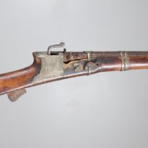 A 19TH CENTURY MATCHLOCK LONG GUN.