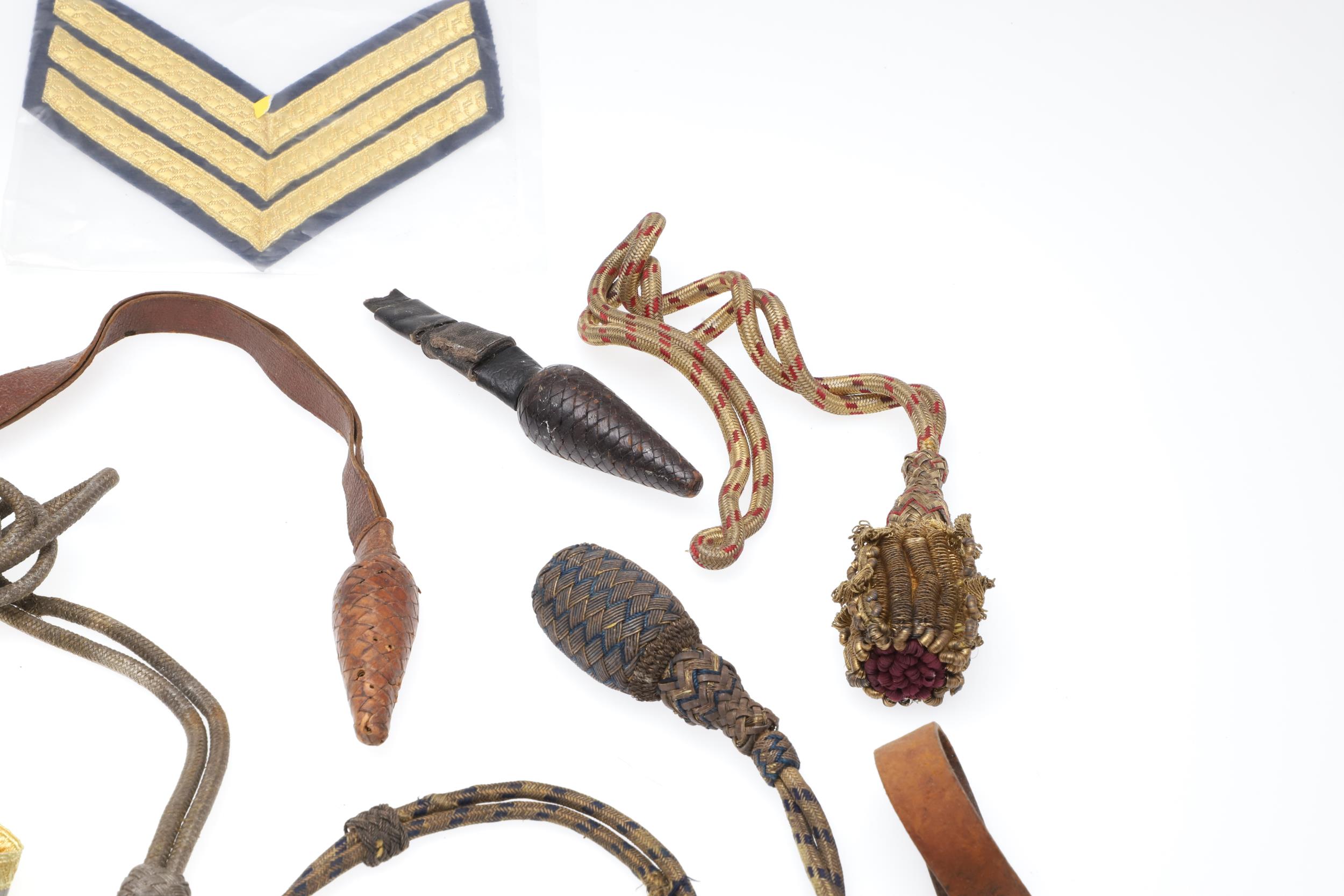 A COLLECTION OF SWORD KNOTS AND MILITARY BADGES. - Image 5 of 11