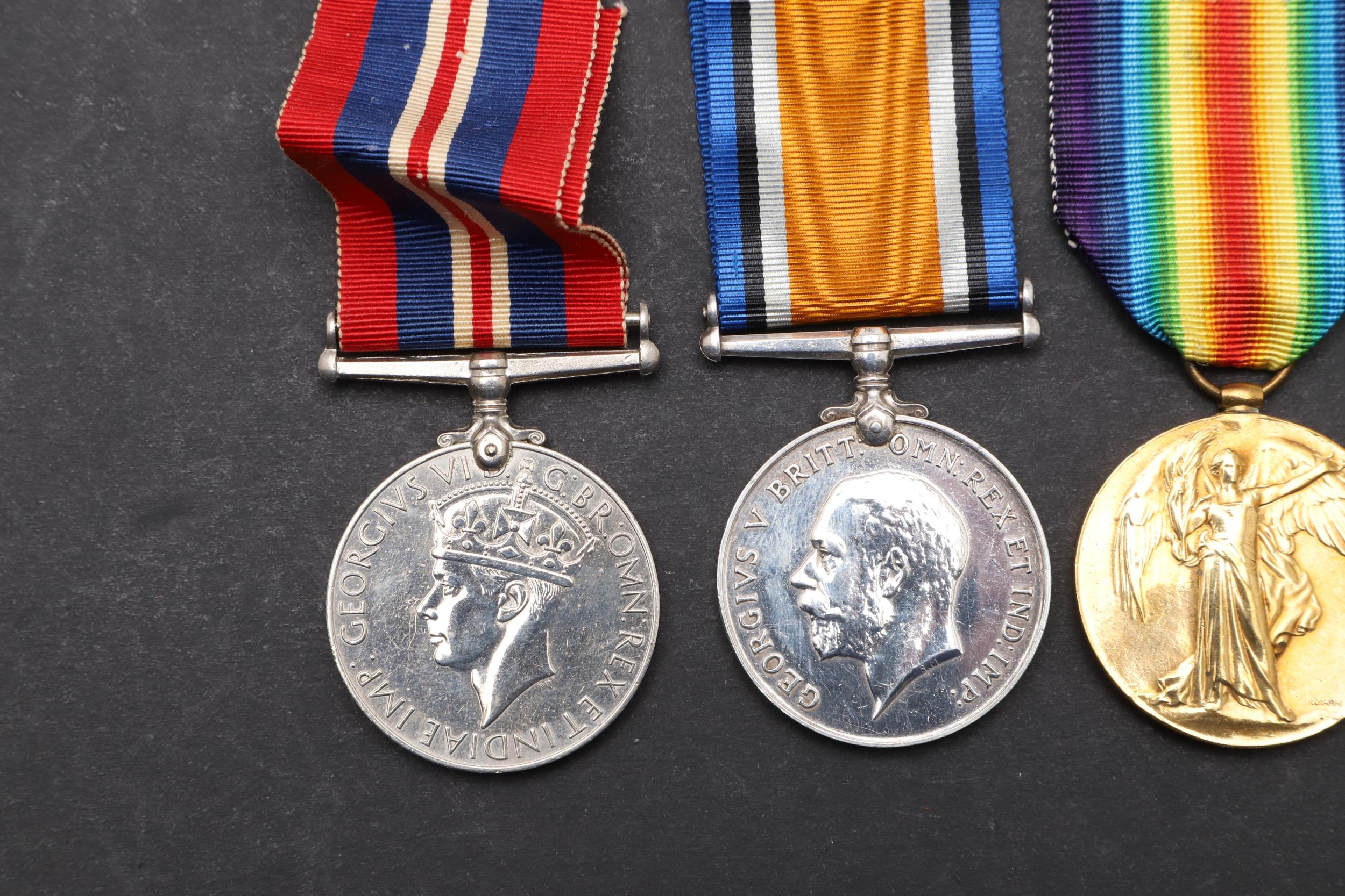 A FIRST WORLD WAR SILVER WAR BADGE AND A SMALL COLLECTION OF MEDALS. - Image 2 of 7