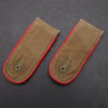 A PAIR OF SECOND WORLD WAR GERMAN AFRIKAKOPS ARTILLERY SHOULDER STRAPS.