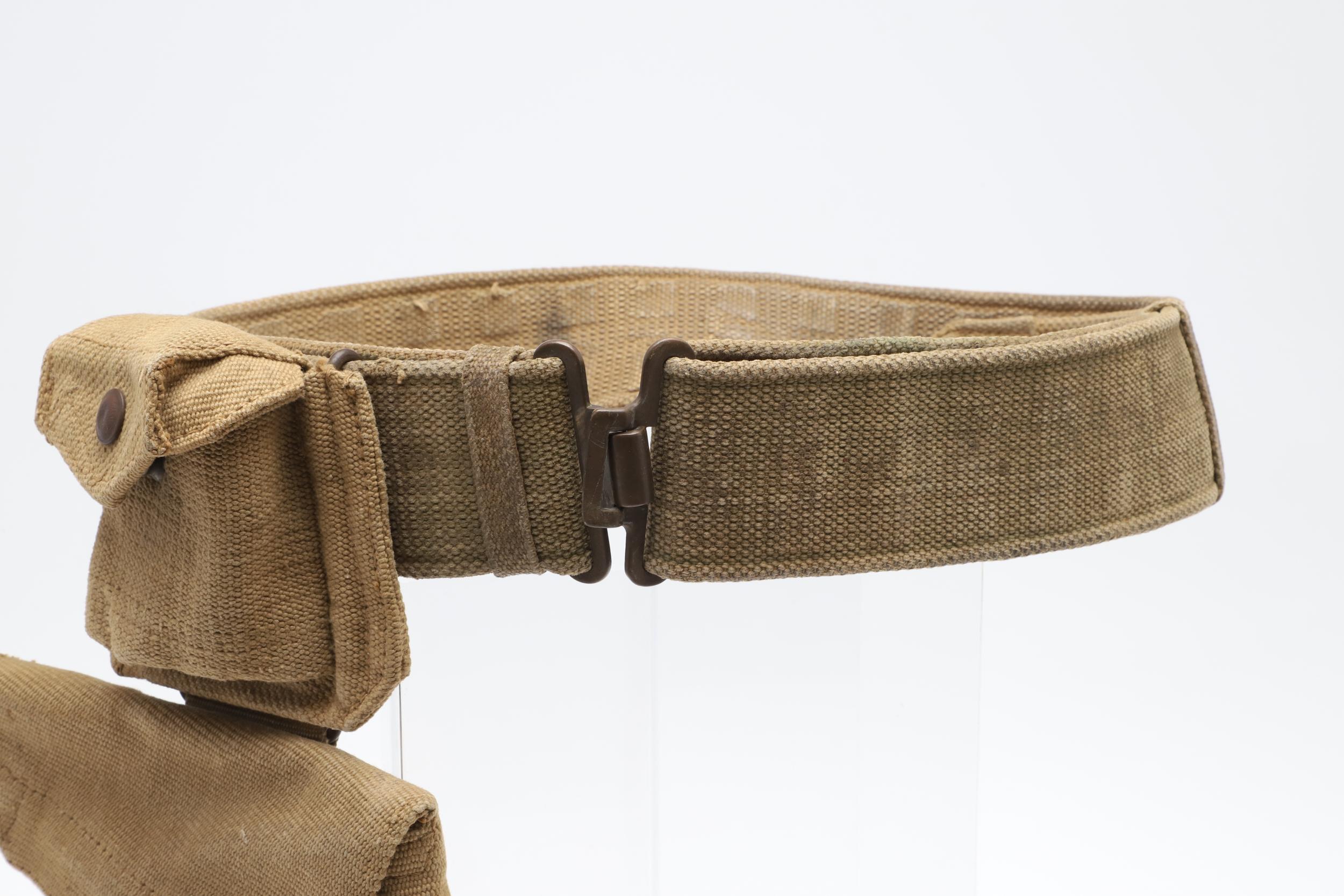 A 1937 PATTERN WEBBING HOLSTER, POUCH AND BELT. - Image 2 of 8