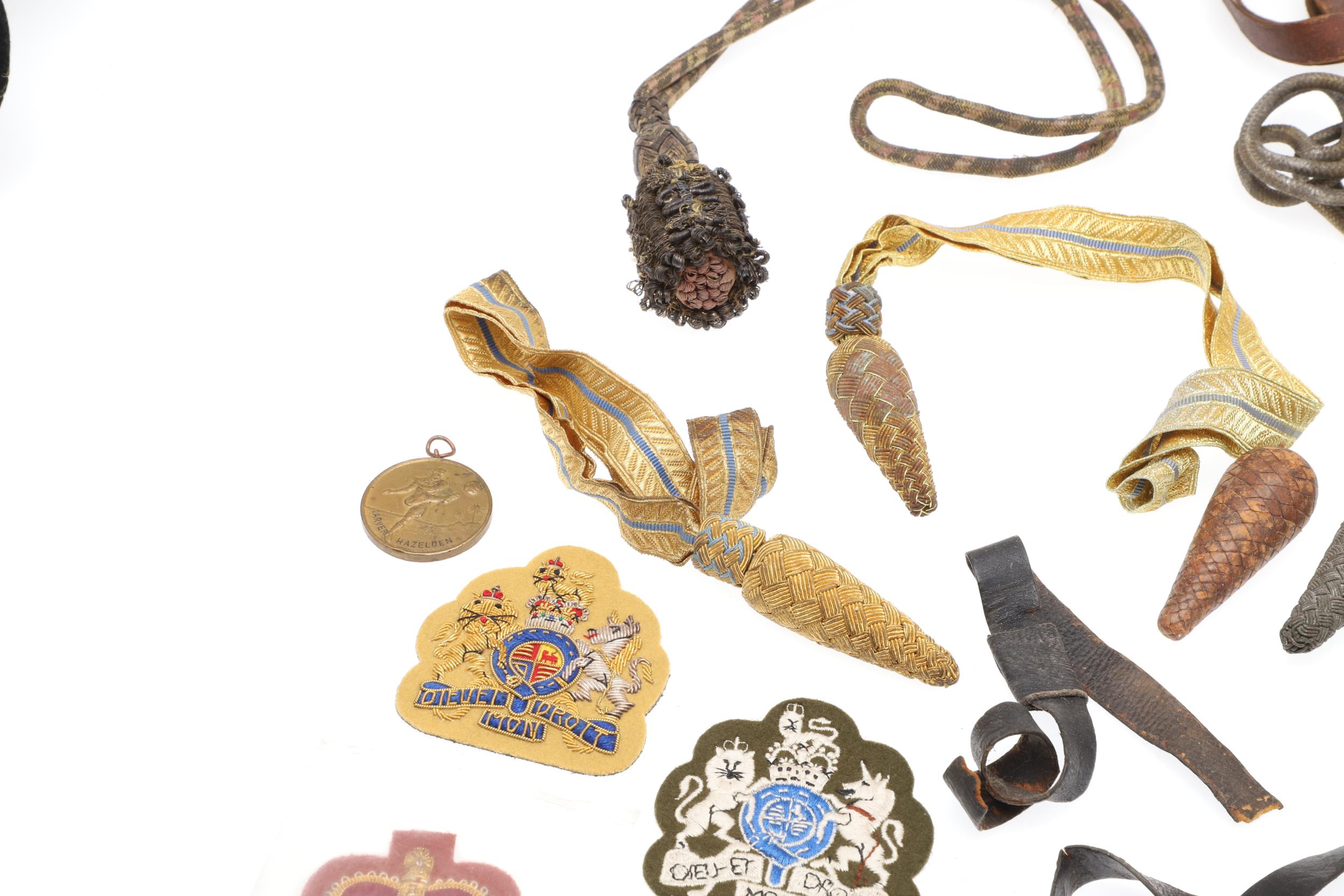 A COLLECTION OF SWORD KNOTS AND MILITARY BADGES. - Image 10 of 11