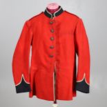 AN EARLY 20TH CENTURY SCARLET TUNIC WITH GENERAL SERVICE BUTTONS.