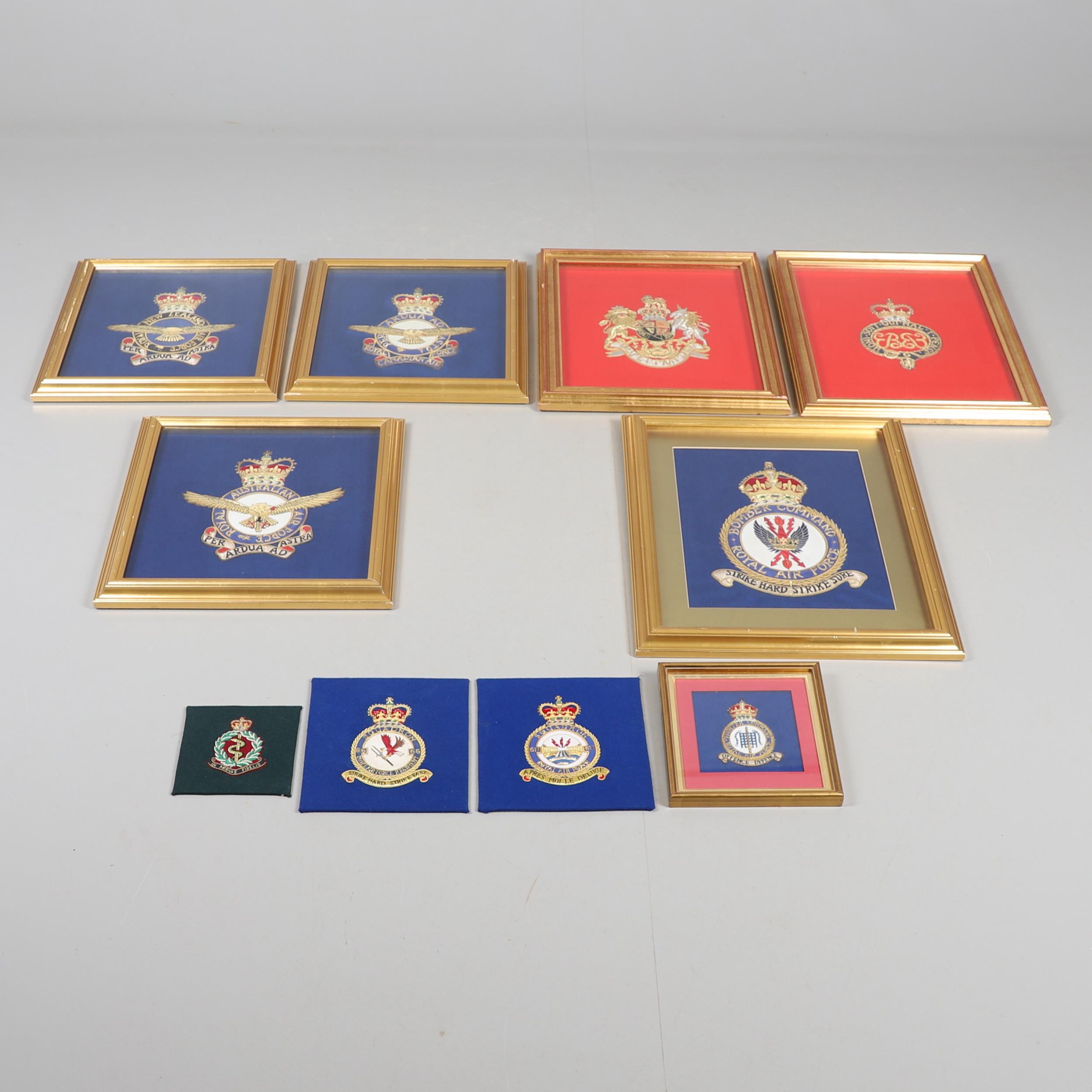 A COLLECTION OF FRAMED NEEDLEWORK MILITARY AND ROYAL CRESTS.