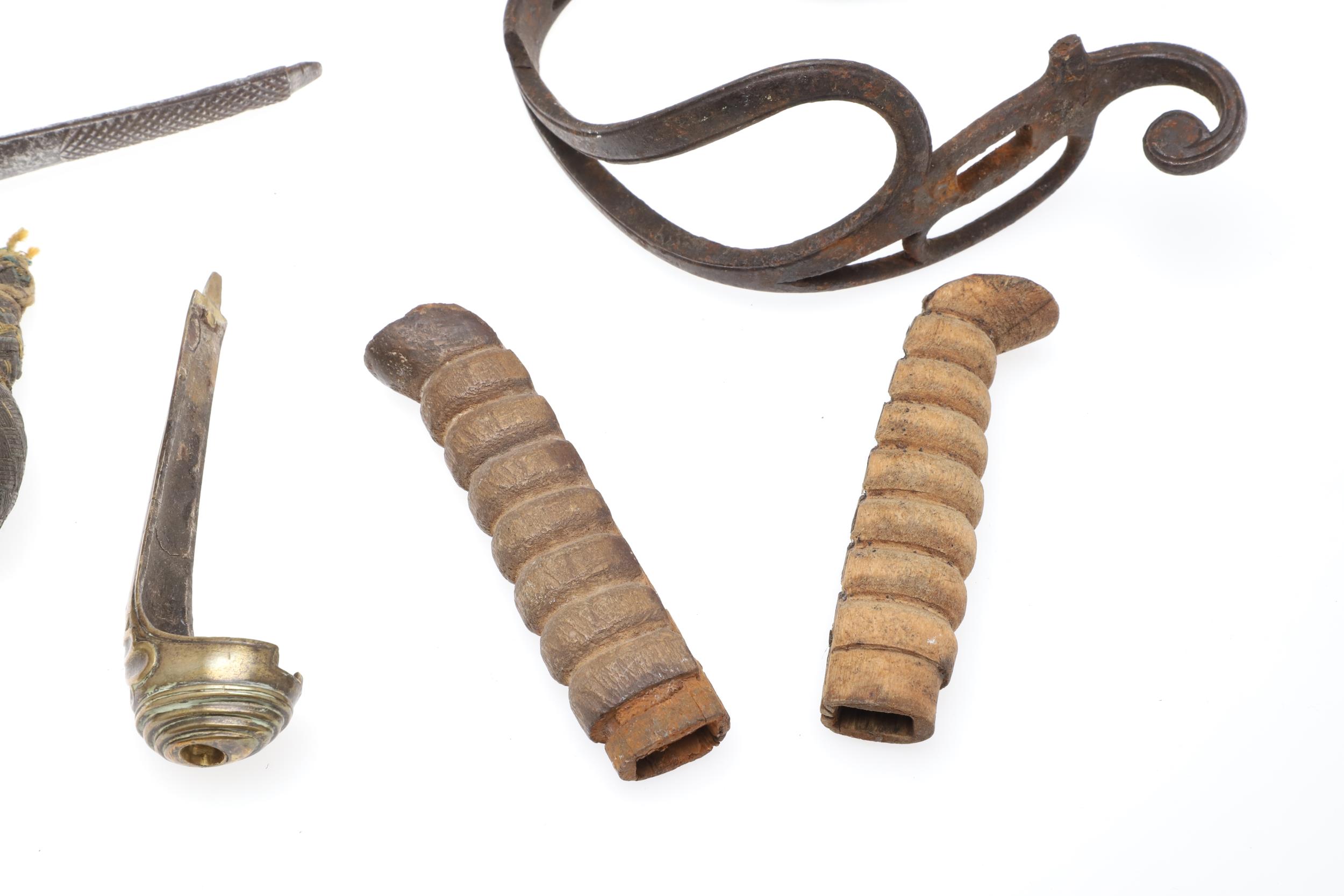 A COLLECTION OF SWORD FITTINGS TO INCLUDE GRIPS, GUARDS AND OTHERS. - Image 7 of 12