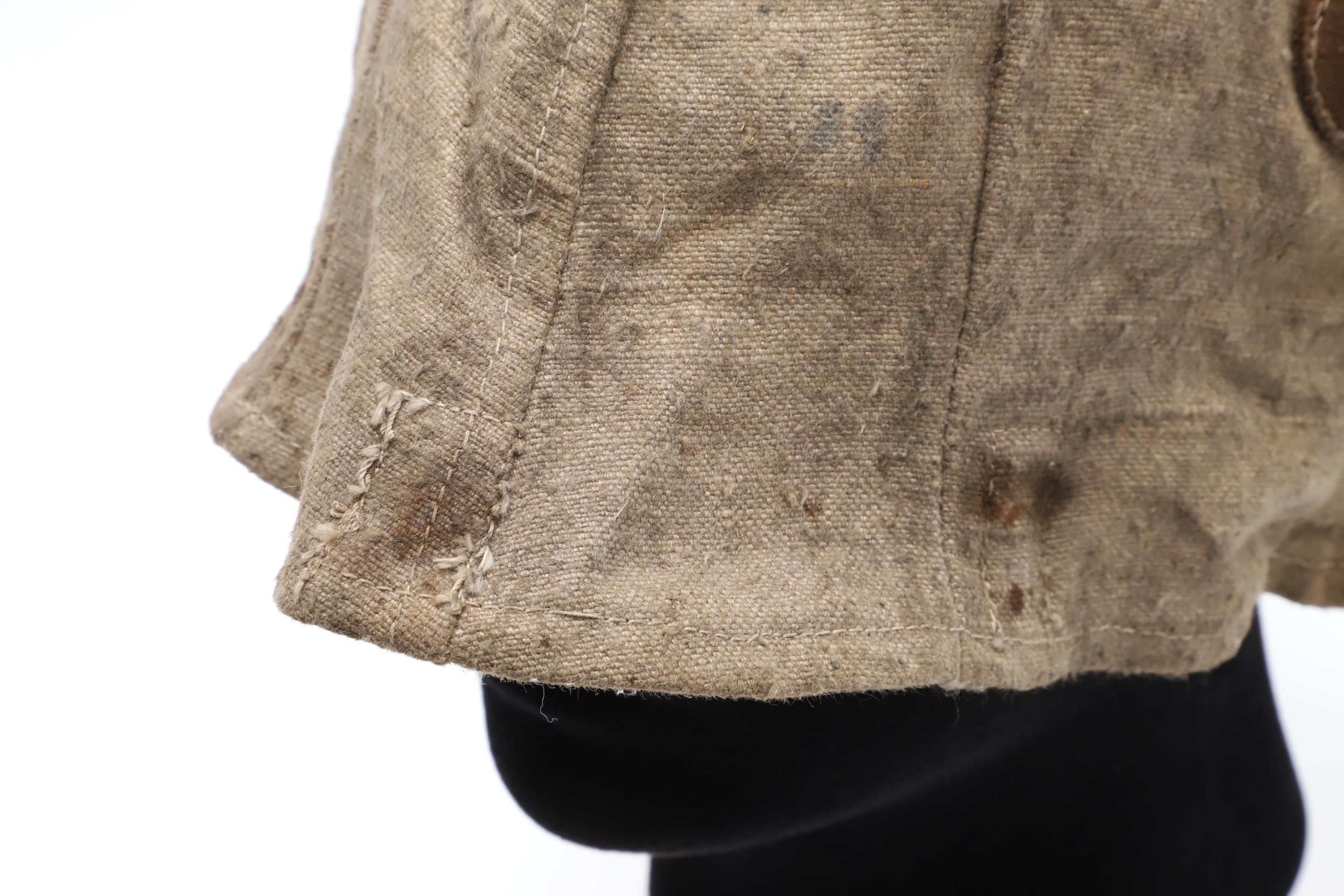 A FIRST WORLD WAR GERMAN STEEL HELMET CLOTH COVER. - Image 2 of 7