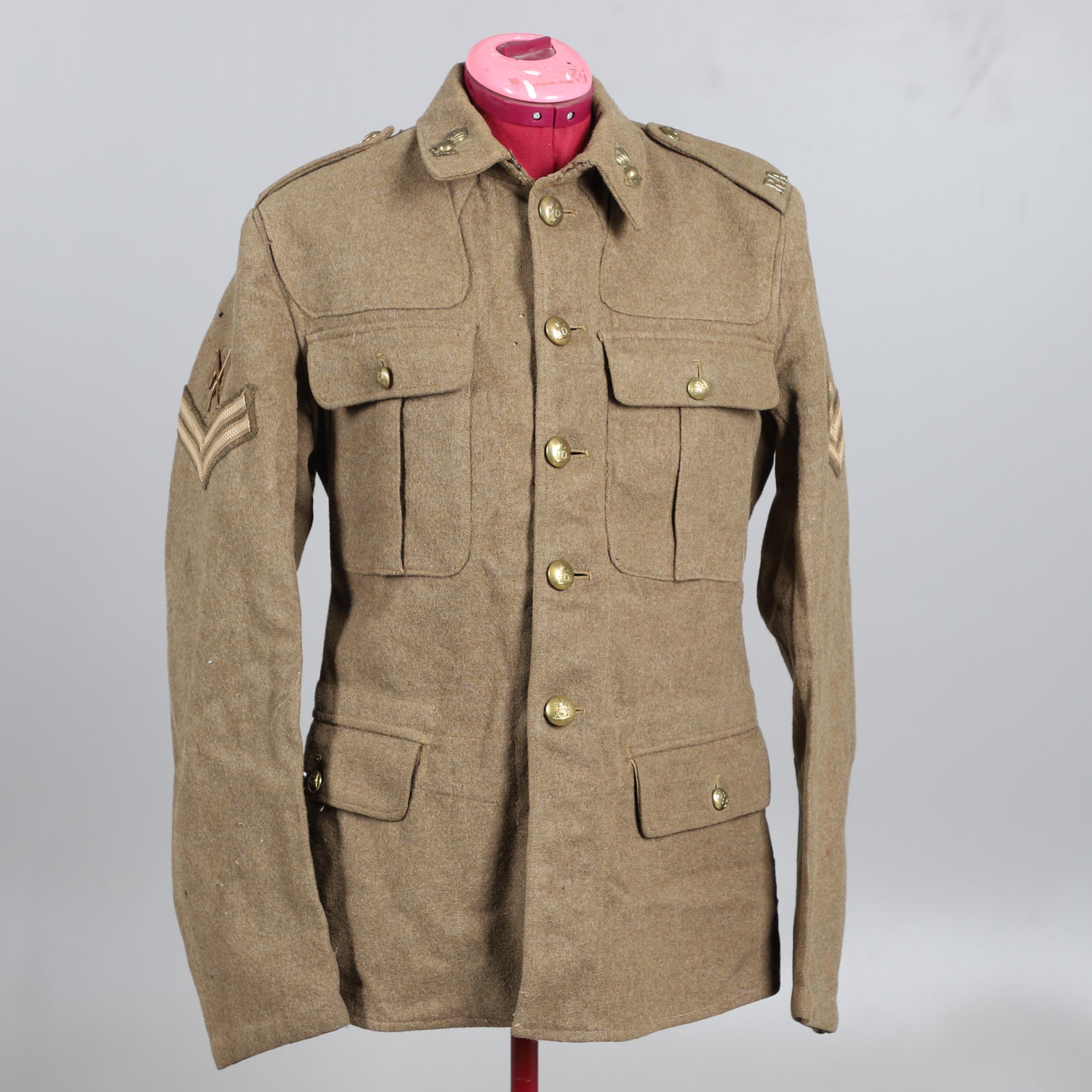 A 1922 PATTERN ARMY TUNIC WITH ROYAL ARTILLERY BUTTONS.