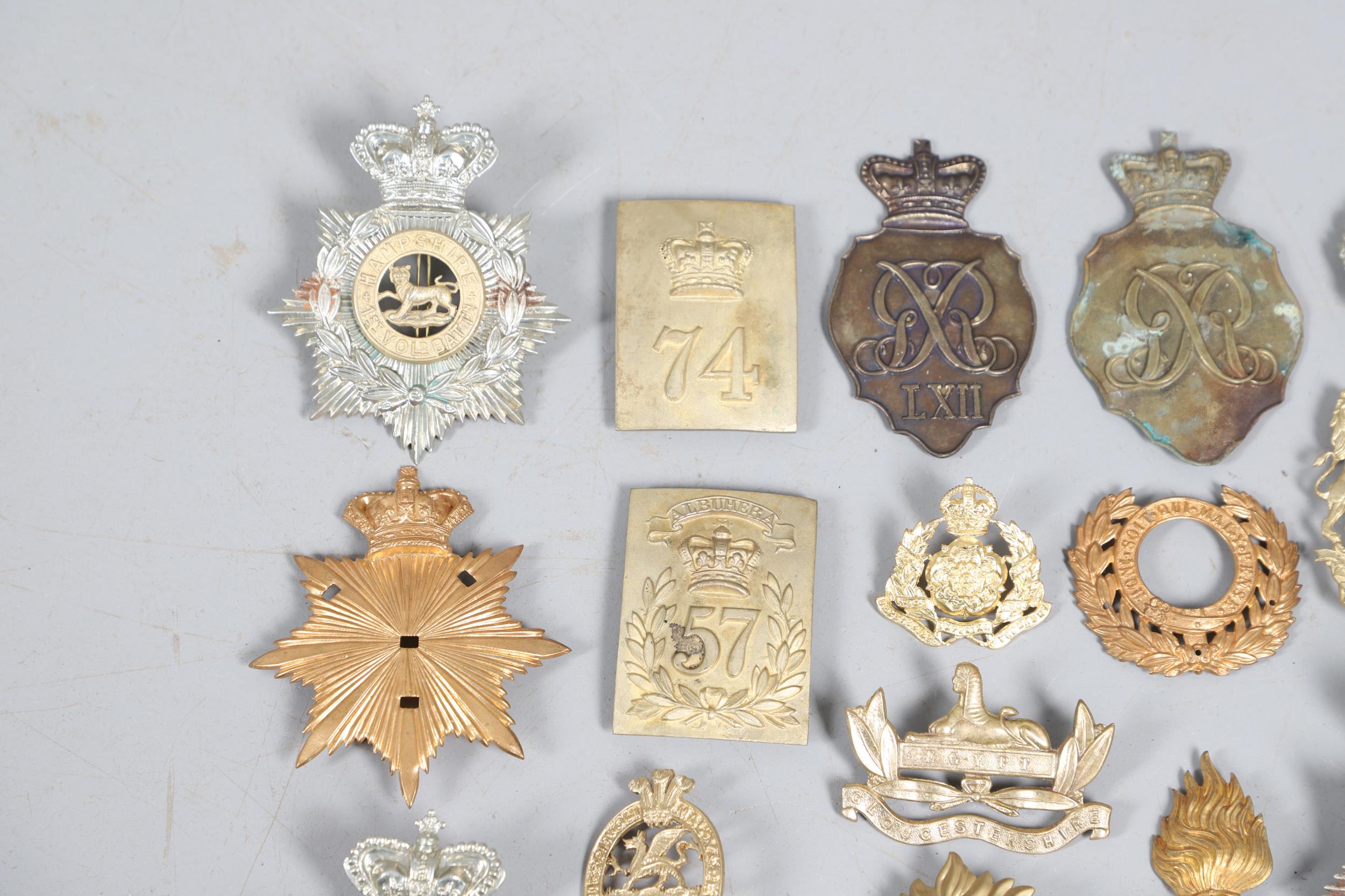 A COLLECTION OF VICTORIAN STYLE HELMET PLATES AND OTHER BADGES. - Image 3 of 10
