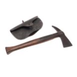 A MERRYWEATHER FIREMAN'S AXE AND LEATHER COVER.