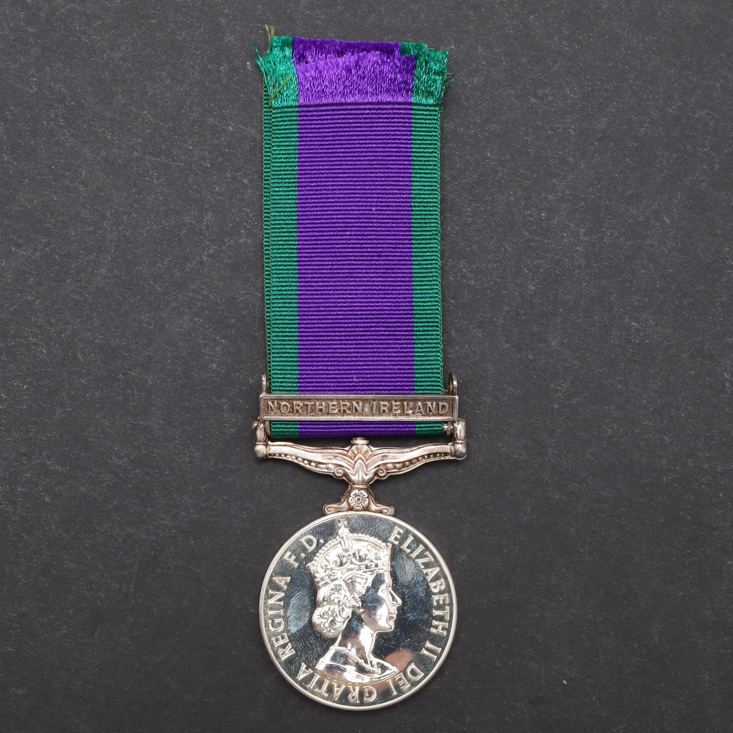 A GENERAL SERVICE MEDAL WITH NORTHERN IRELAND CLASP TO THE ARMED FORCES CHARITY.