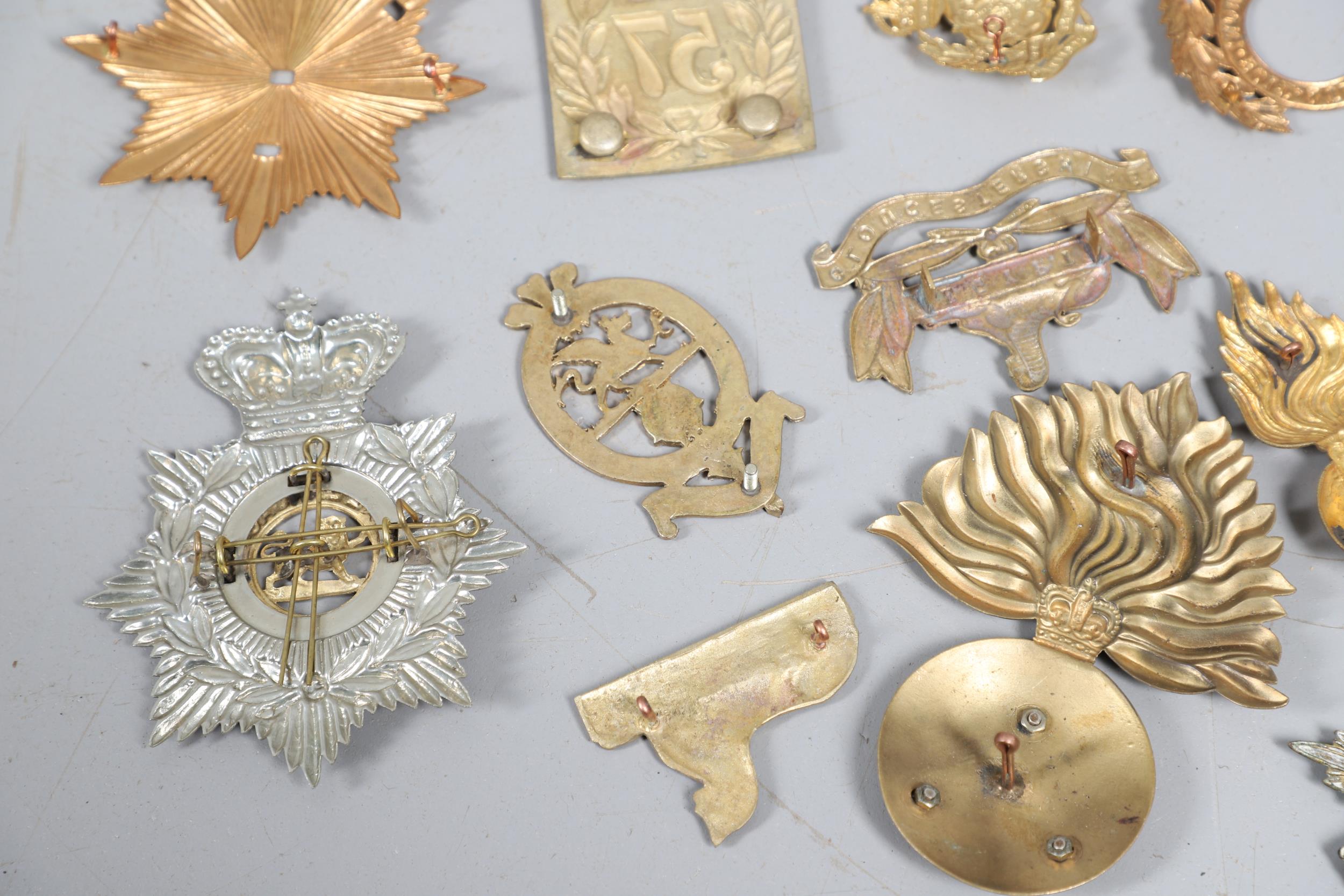 A COLLECTION OF VICTORIAN STYLE HELMET PLATES AND OTHER BADGES. - Image 10 of 10