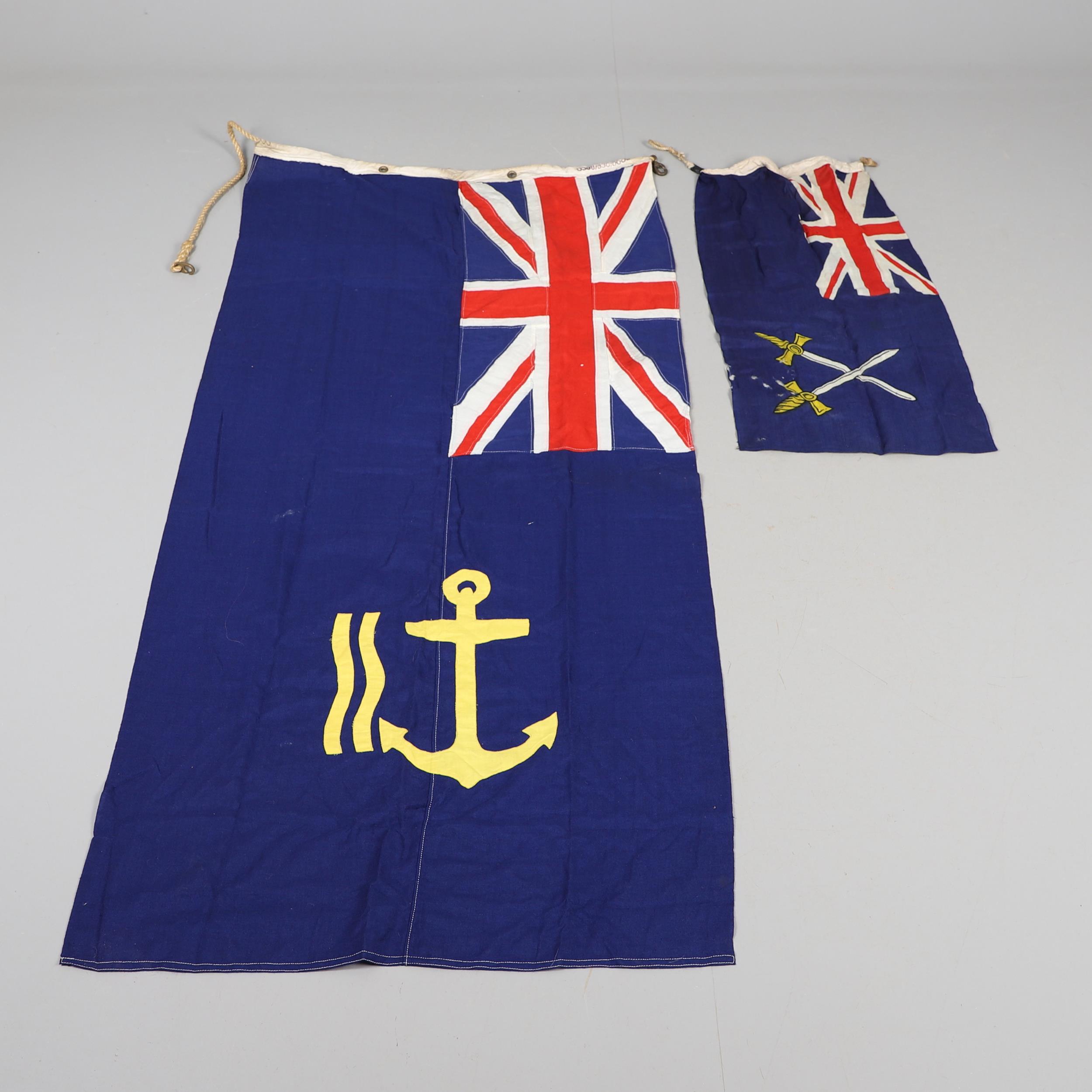 TWO ROYAL FLEET AUXILIARY BLUE ENSIGN FLAGS.