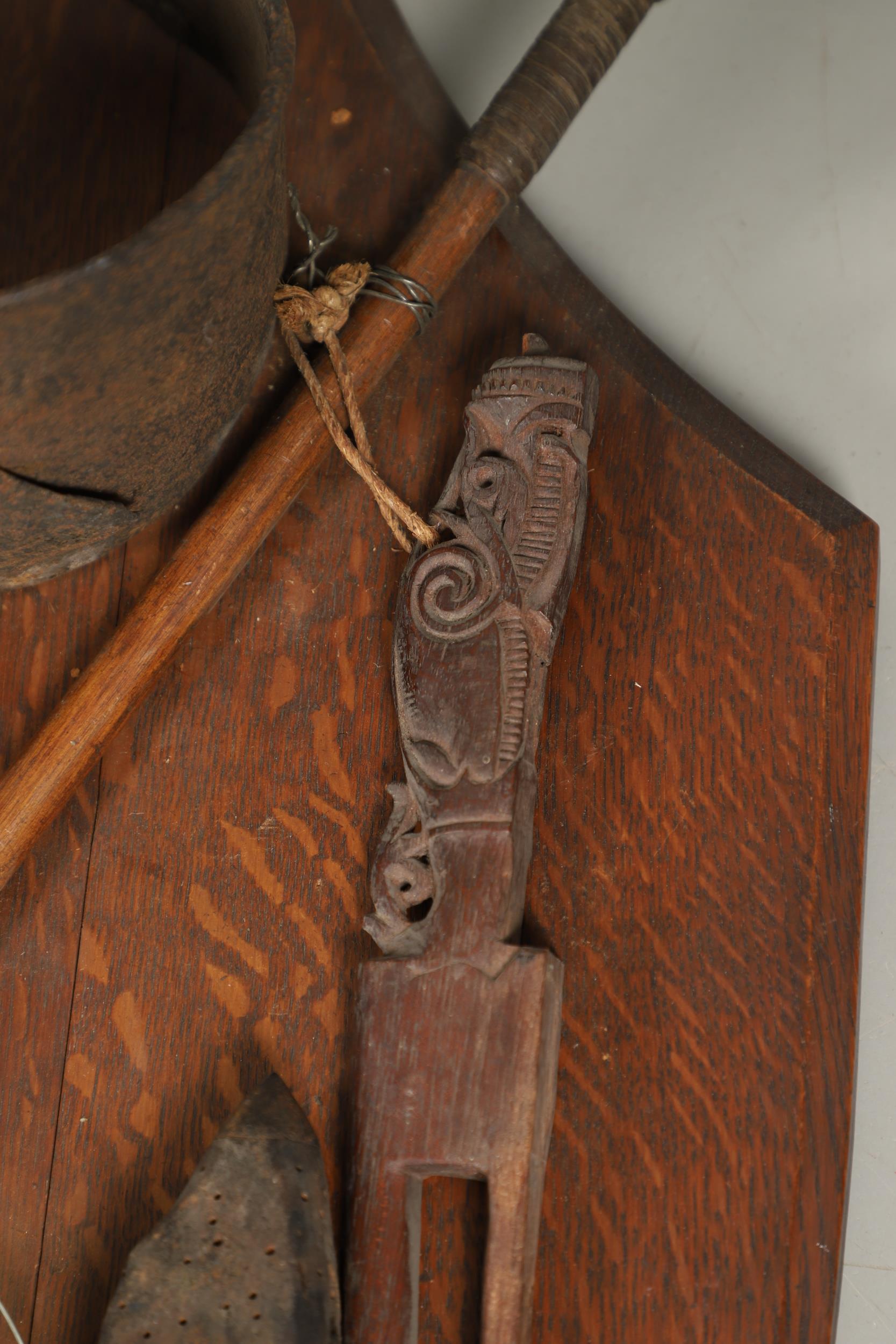 AN UNUSUAL OAK SHIELD MOUNTED WITH MILITARY TROPHIES, CURIOSITIES AND OTHER ITEMS. - Image 12 of 15