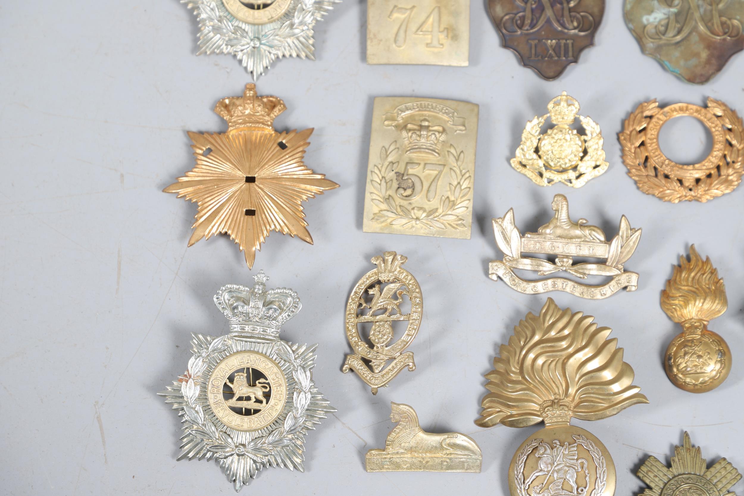 A COLLECTION OF VICTORIAN STYLE HELMET PLATES AND OTHER BADGES. - Image 4 of 10