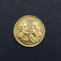 A SMALL GOLD MEDAL, FACING COUPLE, 1605.