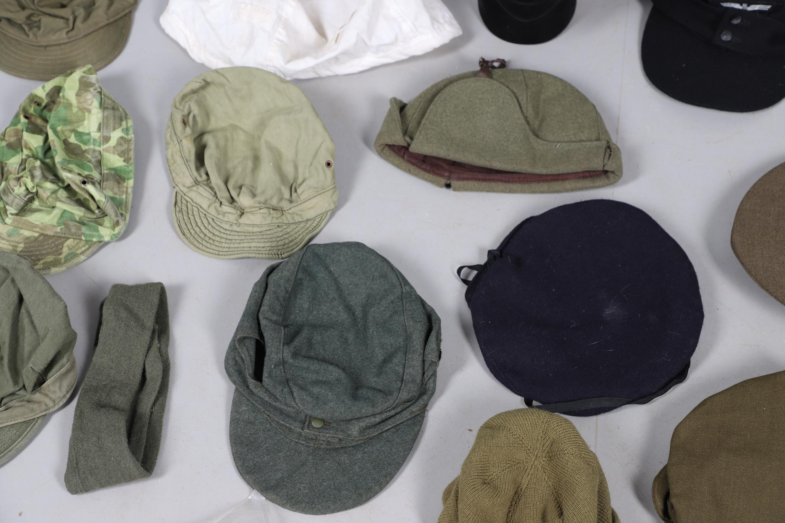 AN EXTENSIVE COLLECTION OF MILITARY UNIFORM CAPS, BERETS AND OTHER ITEMS. SECOND WORLD WAR AND LATER - Image 8 of 17