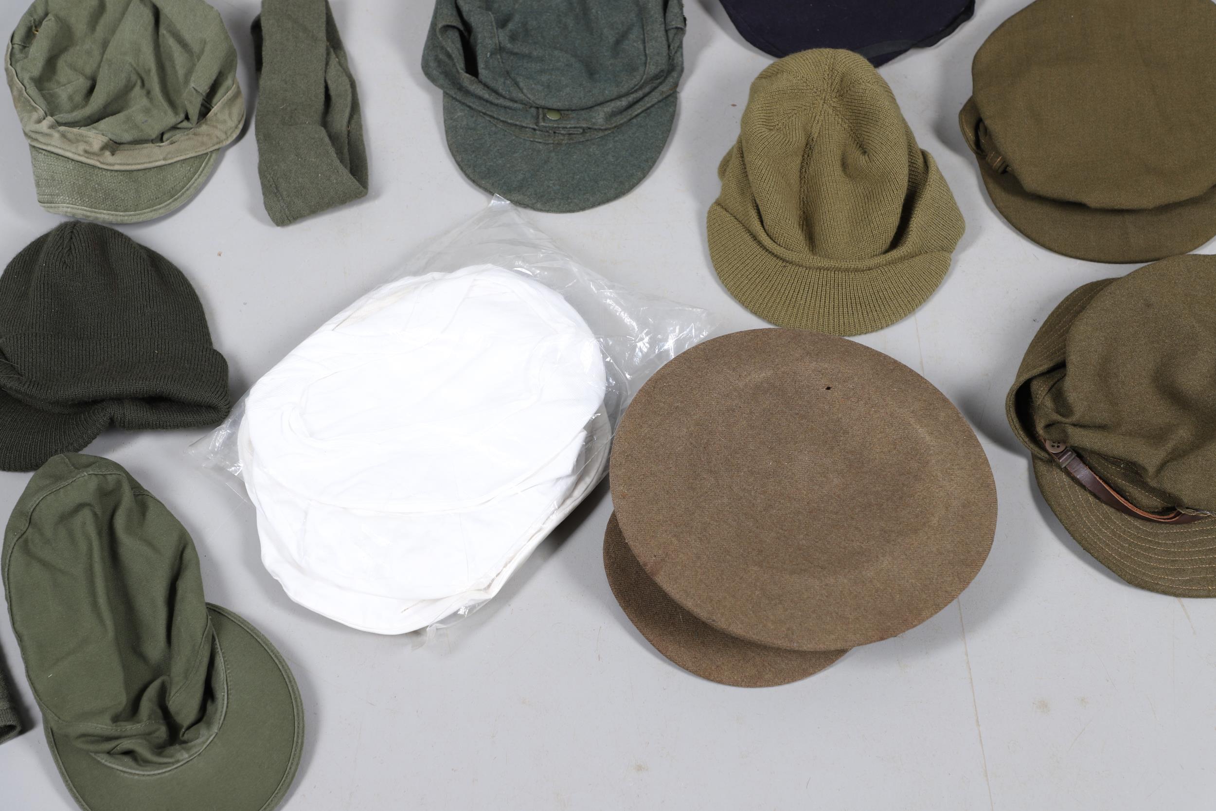 AN EXTENSIVE COLLECTION OF MILITARY UNIFORM CAPS, BERETS AND OTHER ITEMS. SECOND WORLD WAR AND LATER - Image 14 of 17