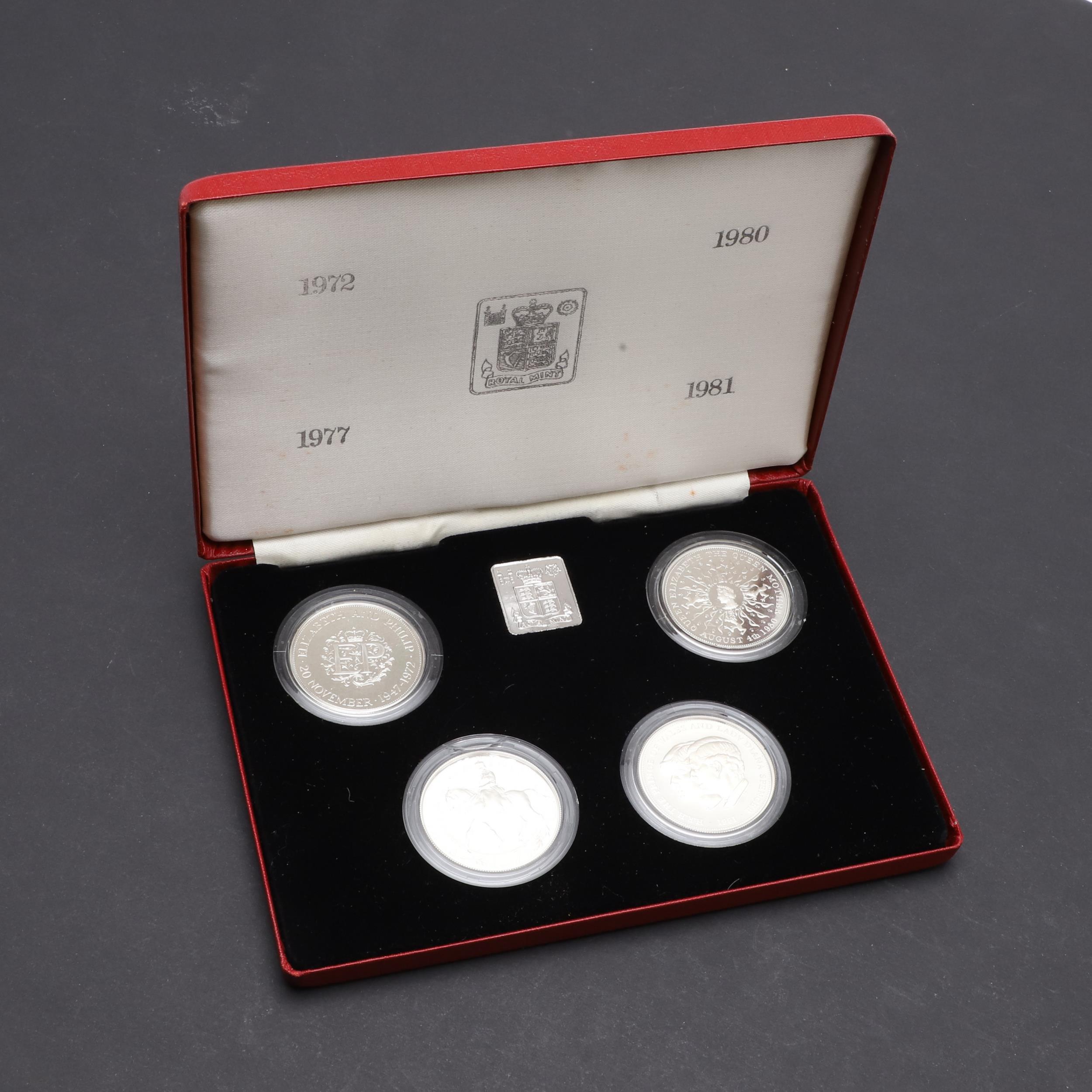 A CASED ROYAL MINT COLLECTION OF FOUR SILVER CROWNS.