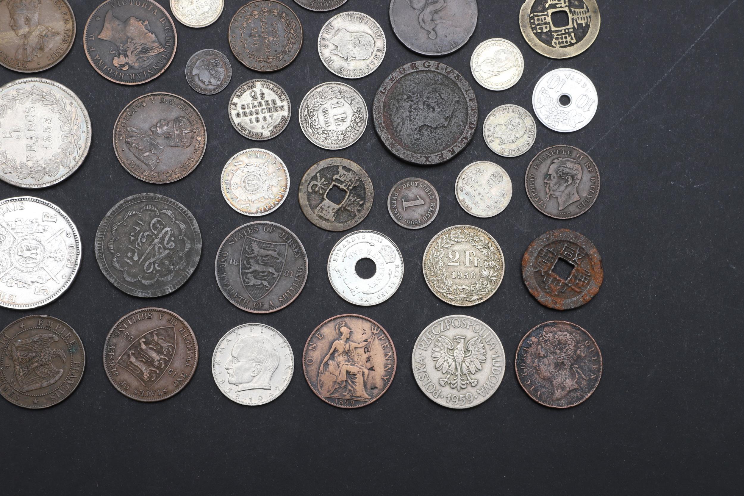 A COLLECTION OF WORLD COINS INCLUDING A NAPOLEON III 5 FRANC COIN. - Image 5 of 5