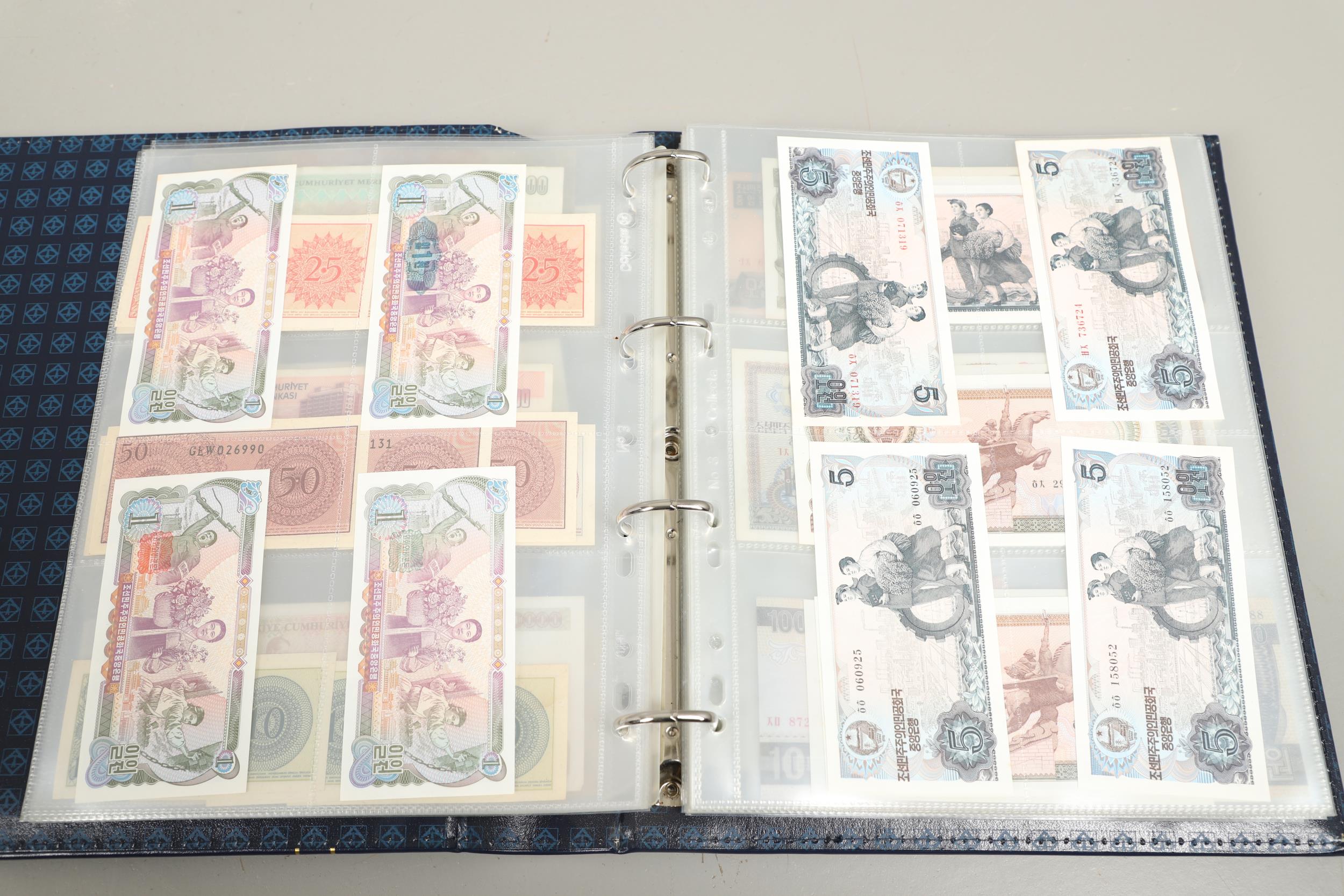 AN ALBUM OF OVER 150 WORLD BANK NOTES TO INCLUDE INDONESIA, IRAQ, CAMBODIA, ISRAEL AND OTHER COUNTRI - Bild 9 aus 15