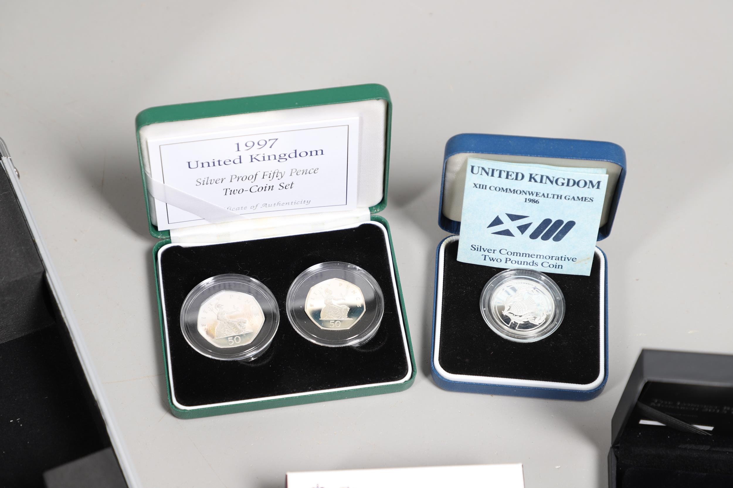 A COLLECTION OF FOURTEEN ROYAL MINT SILVER PROOF AND SIMILAR CROWNS. - Image 2 of 12