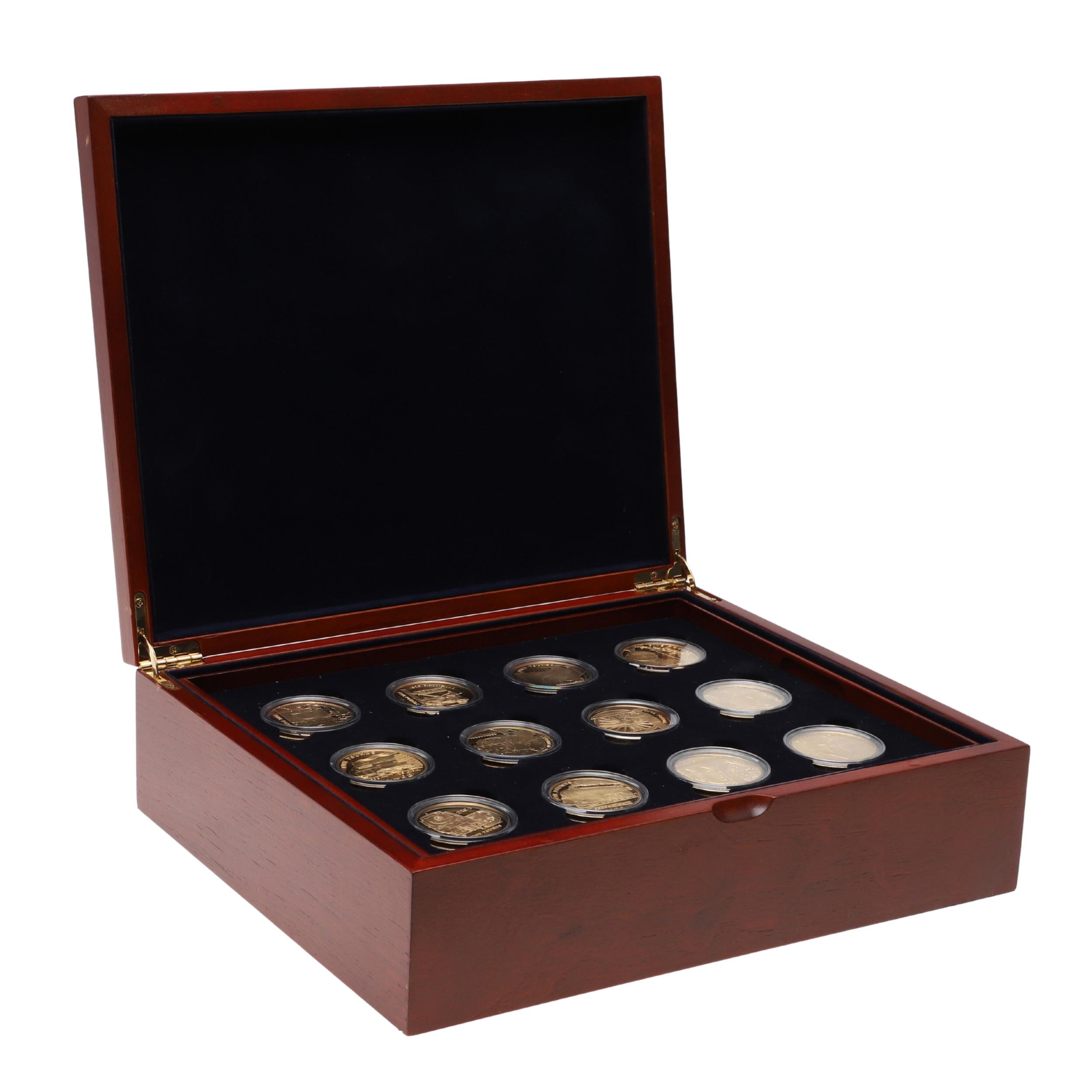 A ROYAL MINT 'THE GOLDEN STEAM AGE' COLLECTION OF 18 SILVER GILT PROOF COINS.