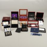 AN EXTENSIVE COLLECTION OF PRESENTATION COIN SETS AND OTHER ISSUES.