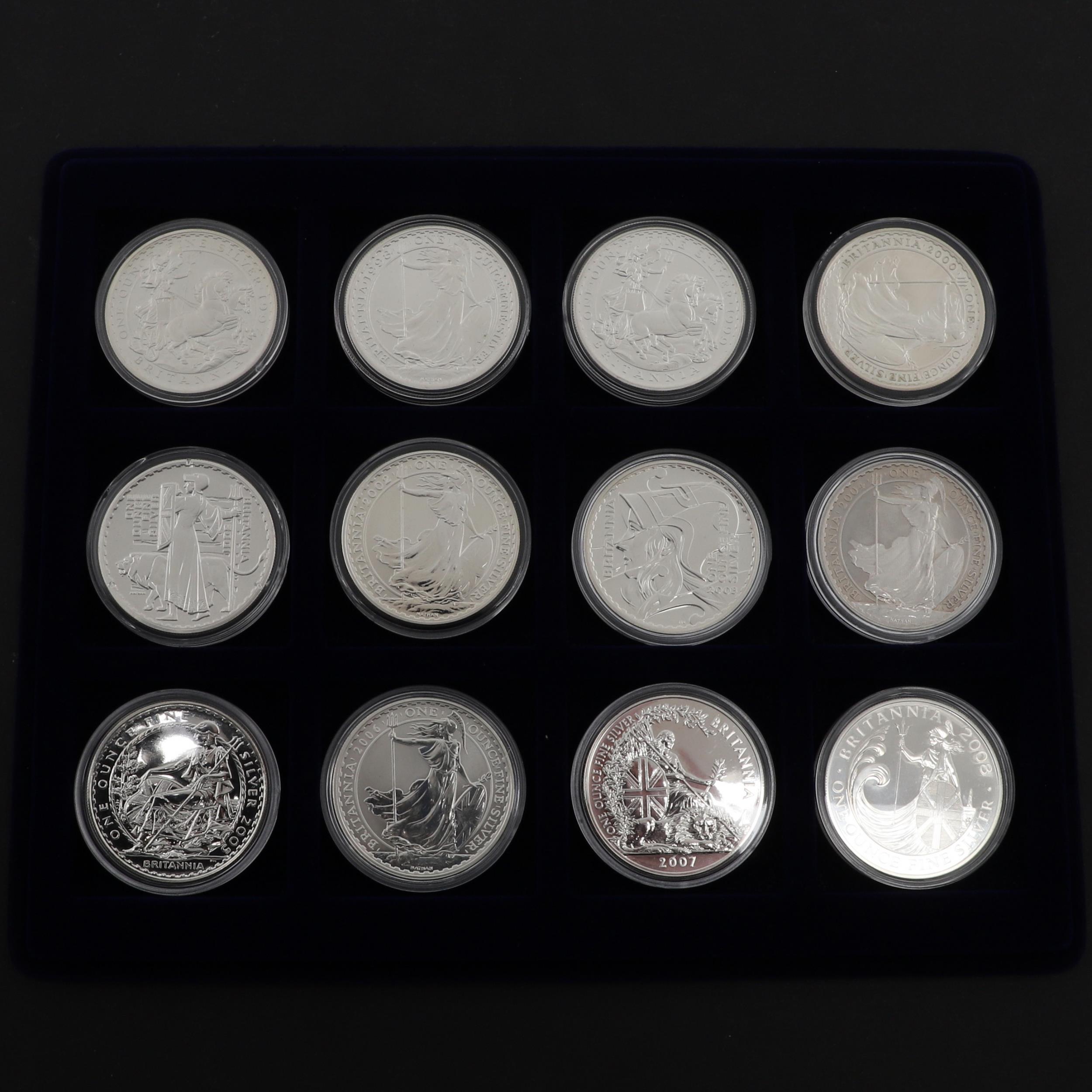 A DATE RUN OF TEN ONE OUNCE SILVER BRITANNIA COINS. 1997 - 2008.