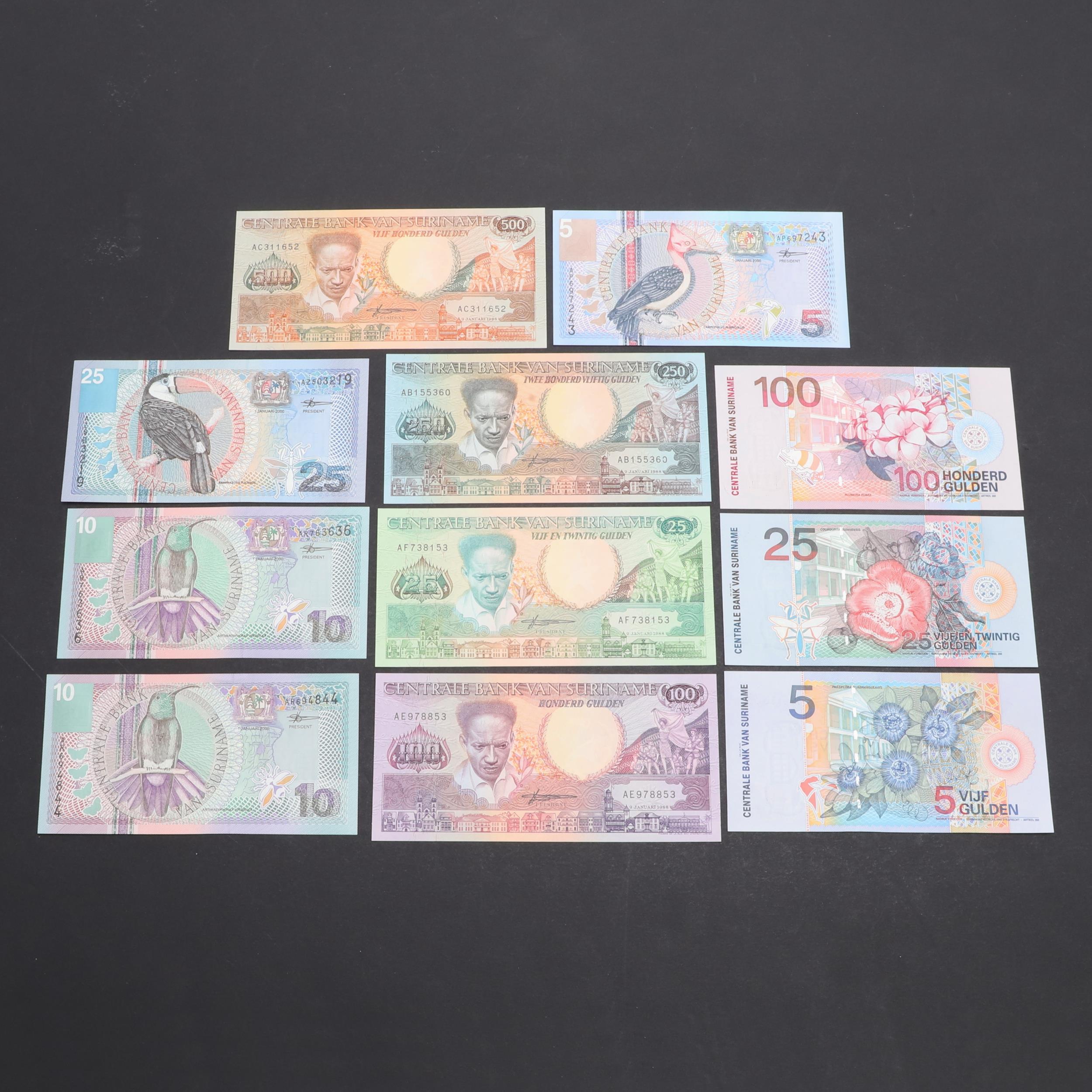 A COLLECTION OF SURINAME BANKNOTES.