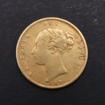 A QUEEN VICTORIA HALF SOVEREIGN, 1876.