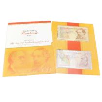 A BANK OF ENGLAND PRESENTATION SET OF 'LAST DICKENS' AND 'FIRST DARWIN' TEN POUND BANKNOTES.