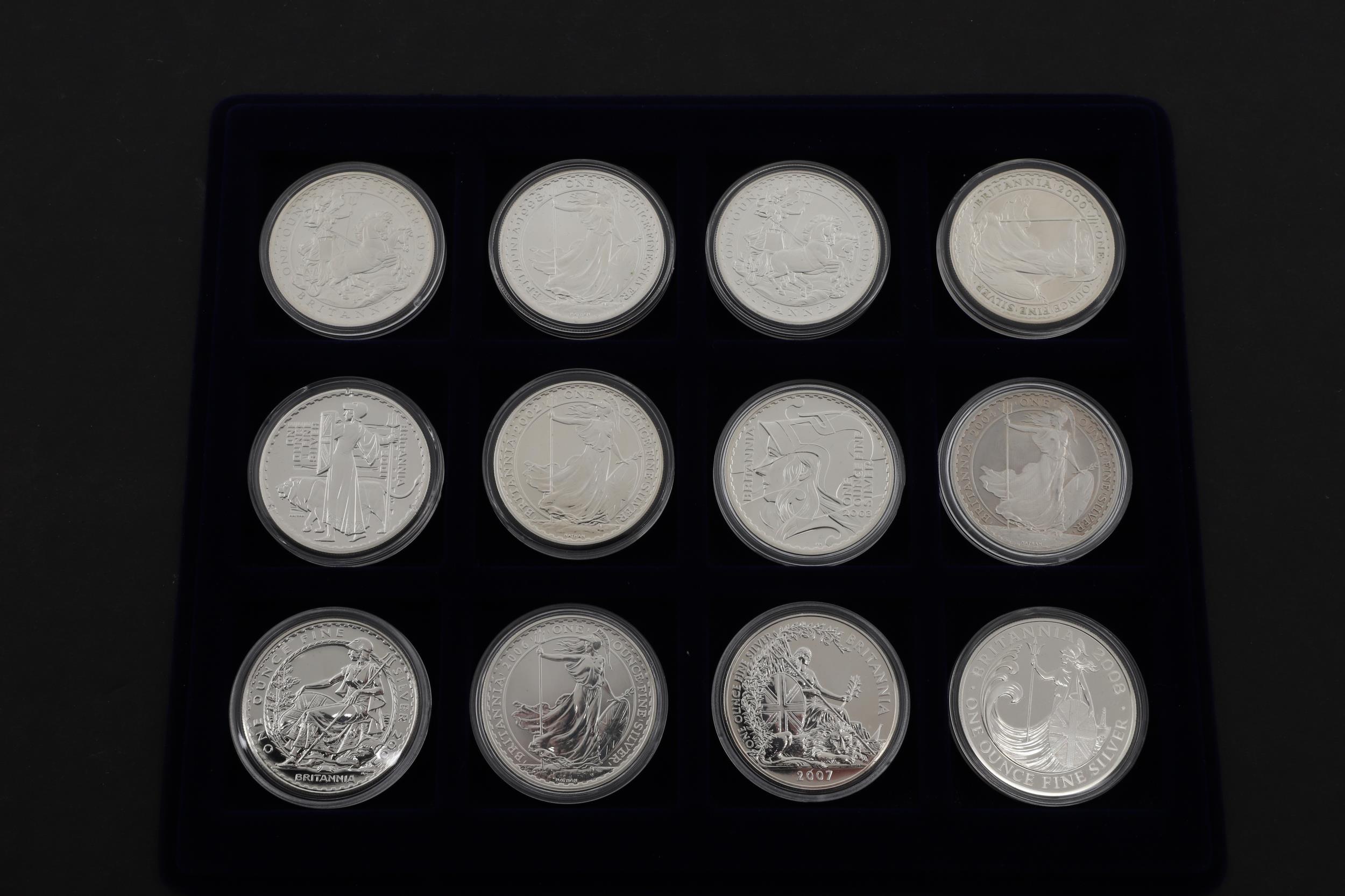 A DATE RUN OF TEN ONE OUNCE SILVER BRITANNIA COINS. 1997 - 2008. - Bild 2 aus 3