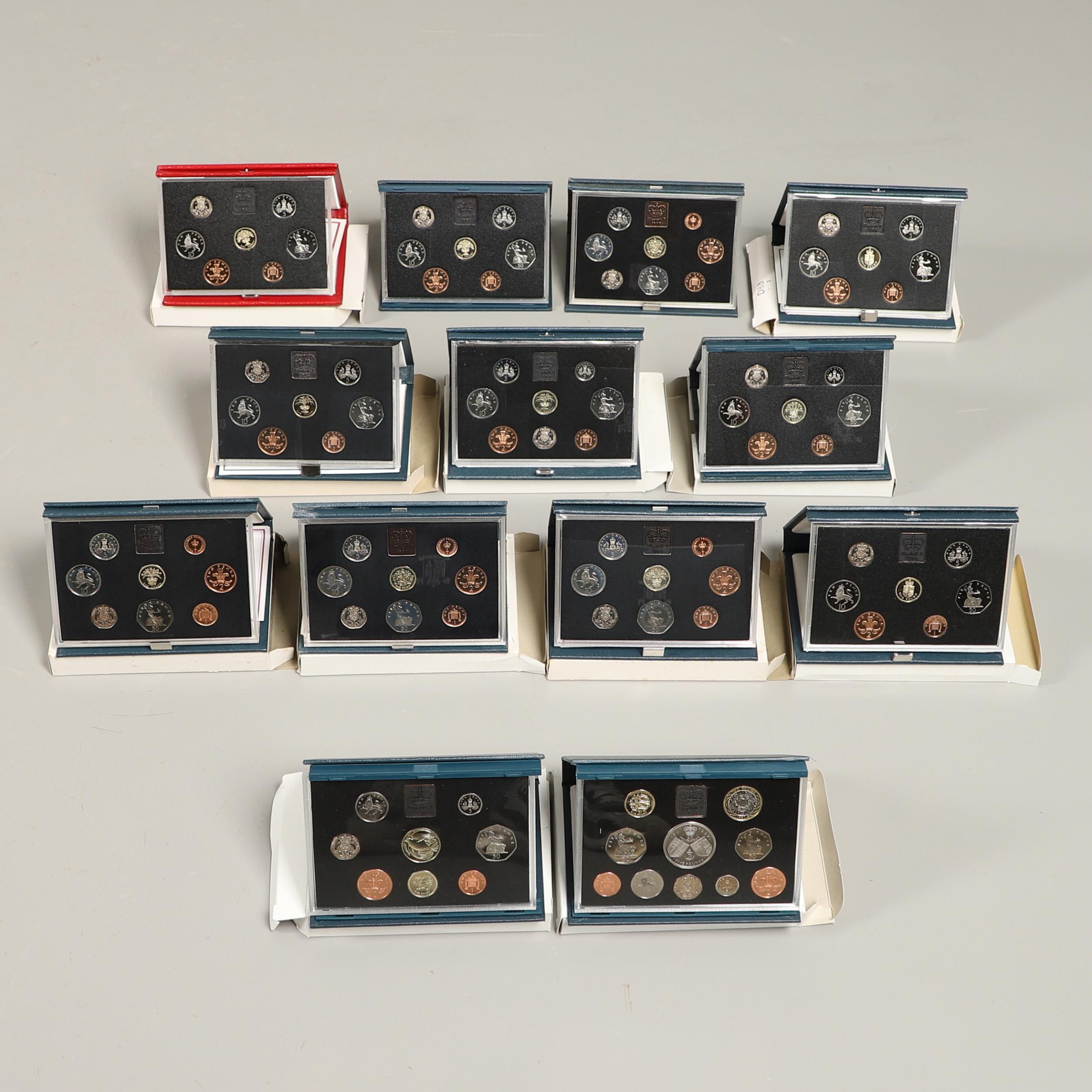 A COLLECTION OF THIRTEEN ROYAL MINT ANNUAL PROOF COIN COLLECTIONS. 1983-1997.