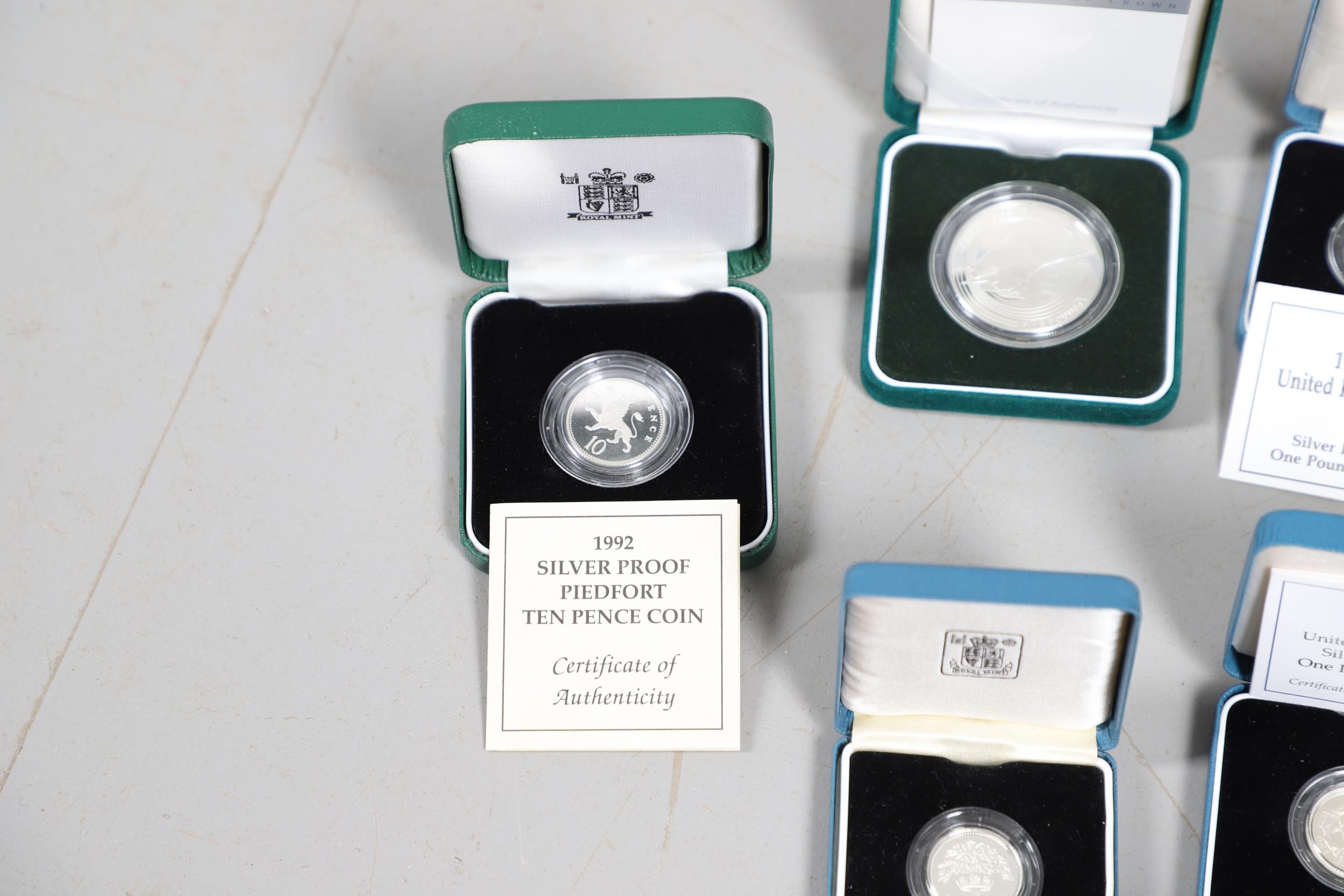 A COLLECTION OF FOURTEEN ROYAL MINT SILVER PROOF AND SIMILAR CROWNS. - Image 10 of 12