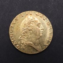 A GEORGE III 'SPADE' GUINEA, 1787.