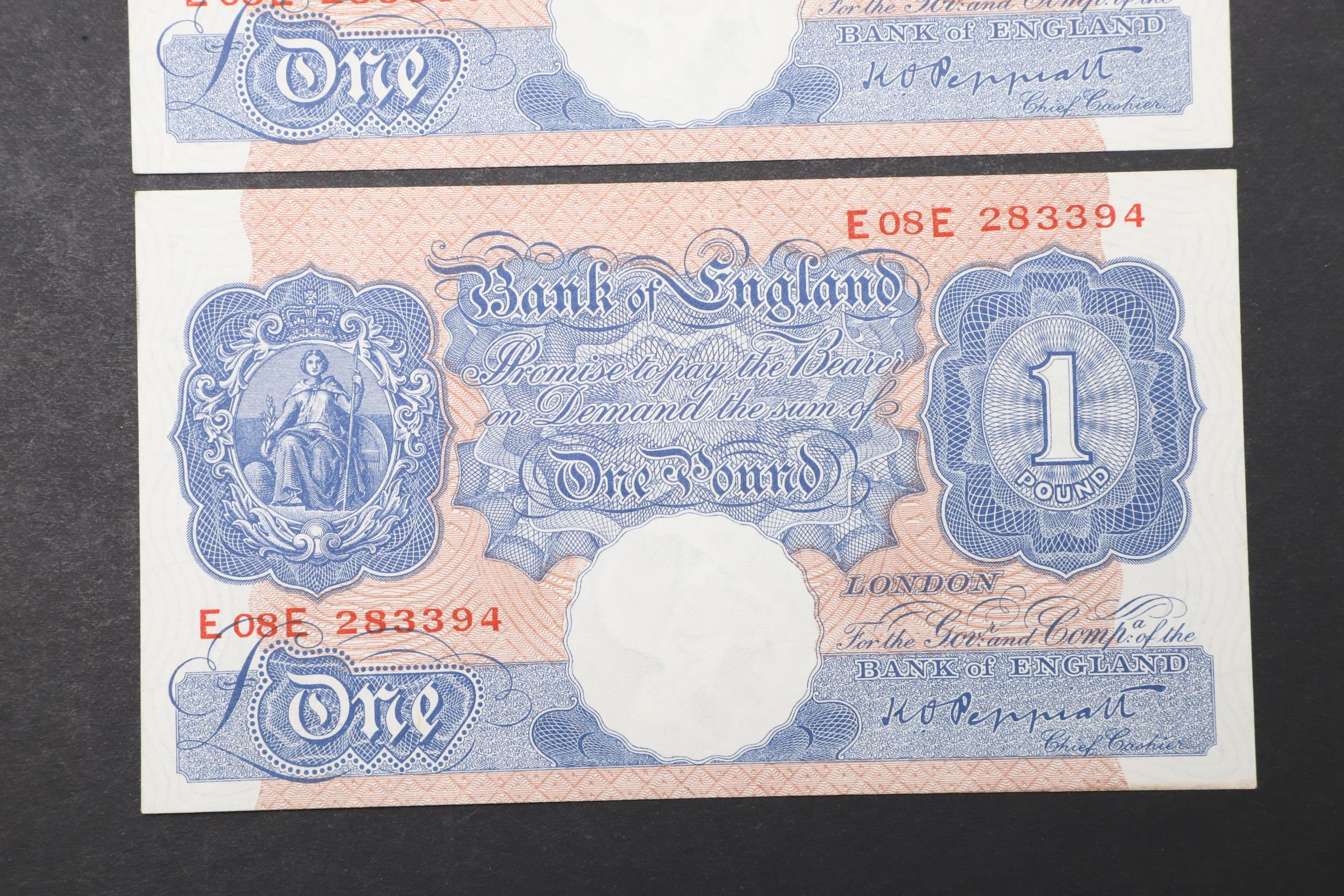 TWO BANK OF ENGLAND SERIES 'A' BLUE ONE POUND NOTES WITH CONSECUTIVE NUMBERS. - Image 3 of 4