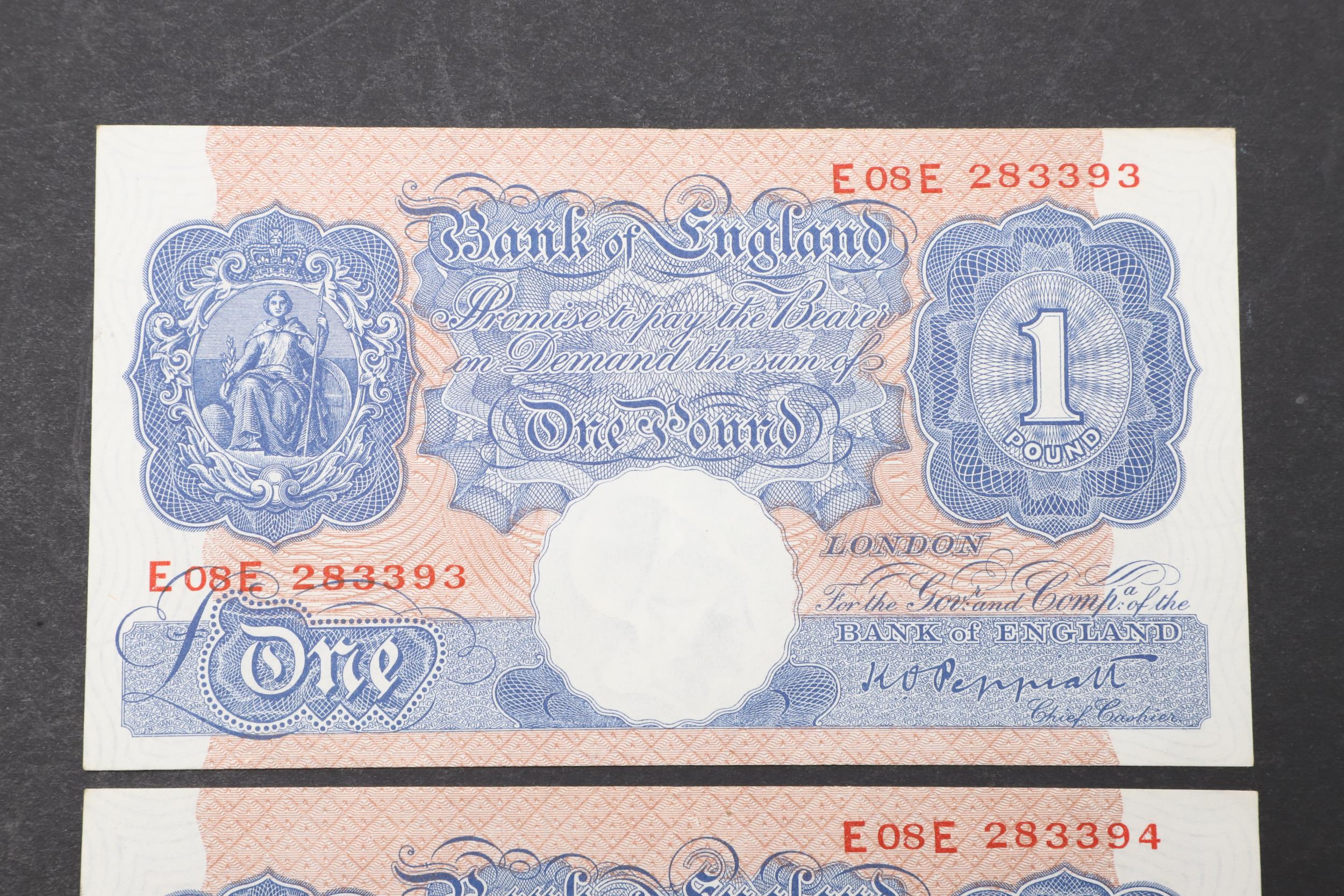 TWO BANK OF ENGLAND SERIES 'A' BLUE ONE POUND NOTES WITH CONSECUTIVE NUMBERS. - Image 2 of 4