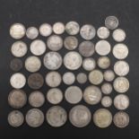 A COLLECTION OF WORLD SILVER COINS TO INCLUDE INDIAN AND SOUTH AFRICAN COINS.