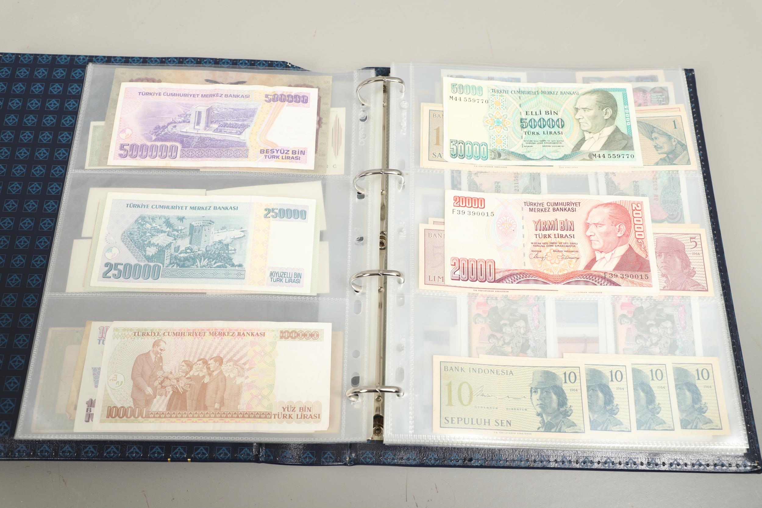 AN ALBUM OF OVER 150 WORLD BANK NOTES TO INCLUDE INDONESIA, IRAQ, CAMBODIA, ISRAEL AND OTHER COUNTRI - Bild 5 aus 15
