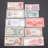 A COLLECTION OF JAPANESE AND CHINESE BANKNOTES.