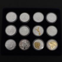 A COLLECTION OF CROWN SIZED SILVER PROOF ISSUES.