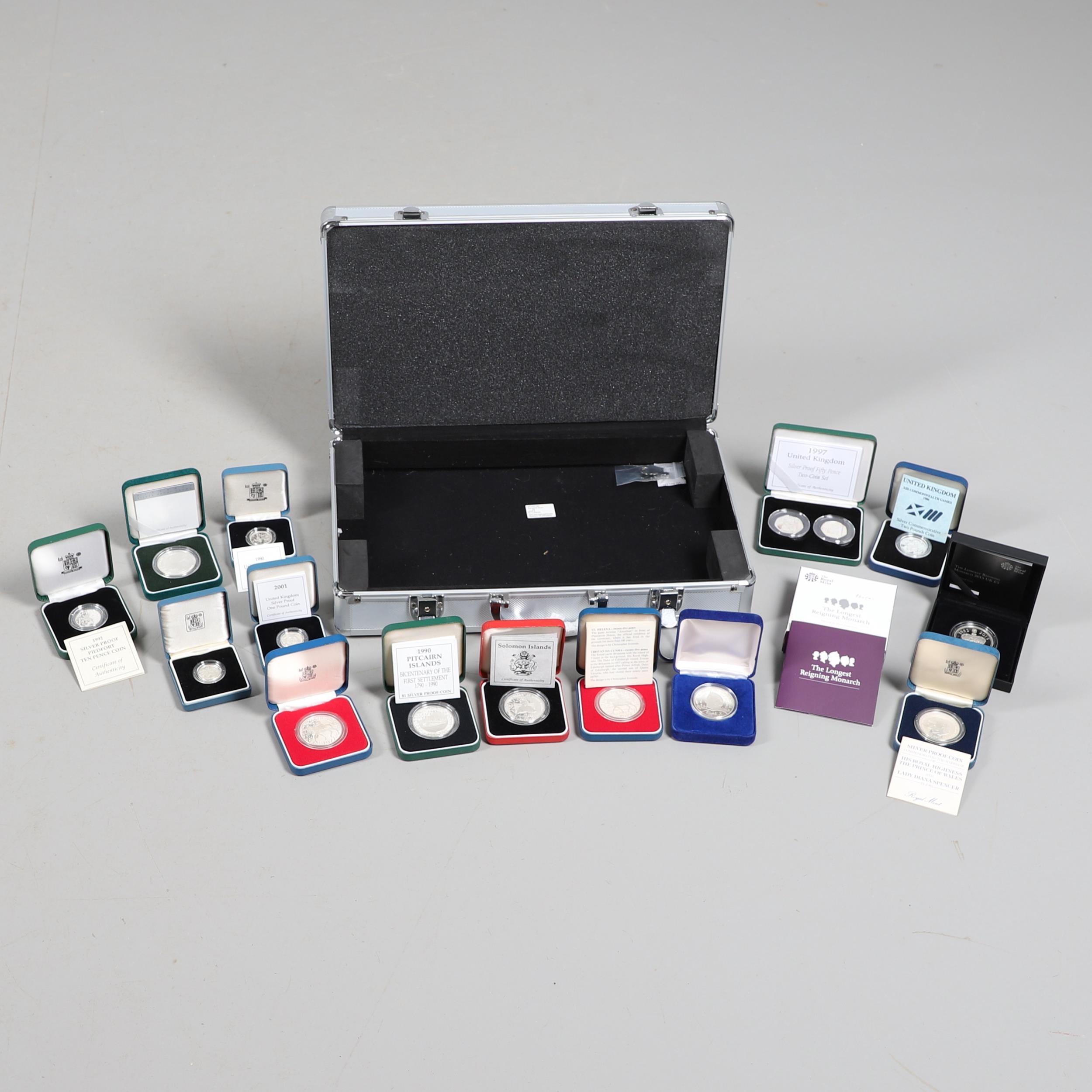 A COLLECTION OF FOURTEEN ROYAL MINT SILVER PROOF AND SIMILAR CROWNS.