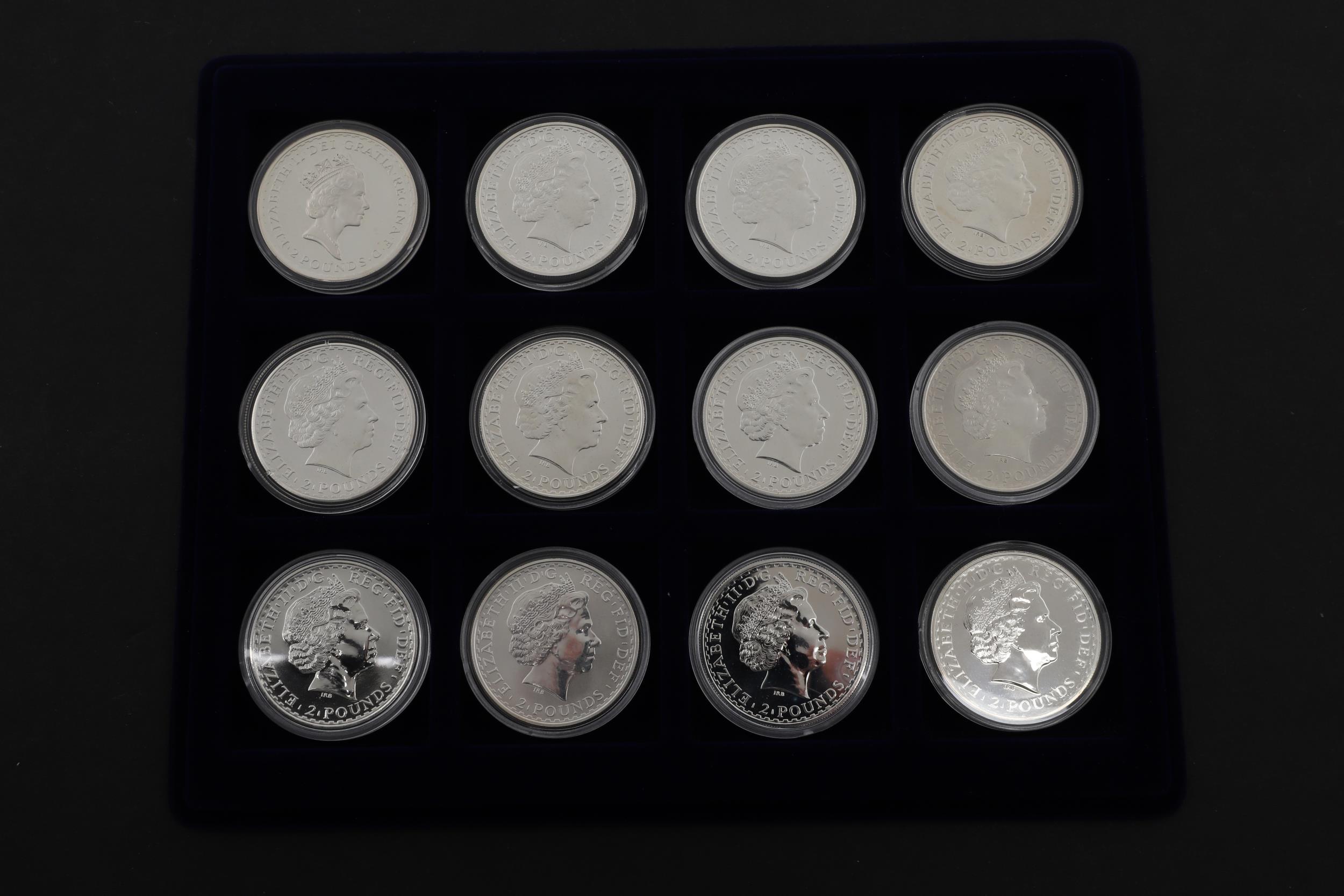 A DATE RUN OF TEN ONE OUNCE SILVER BRITANNIA COINS. 1997 - 2008. - Bild 3 aus 3